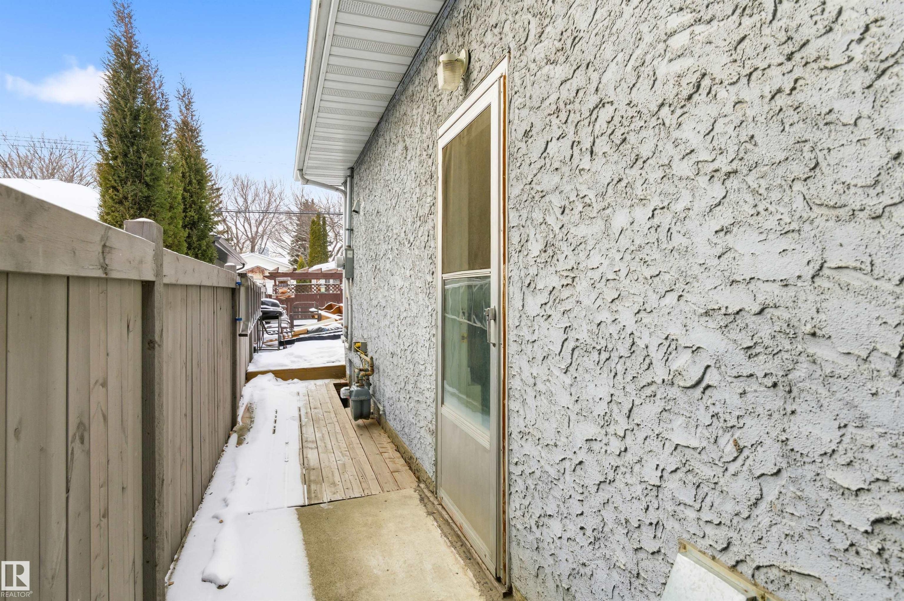 View of property exterior with stucco siding - 10332 82 Street, Edmonton, AB - Outdoor