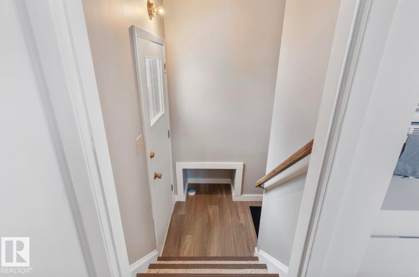 Stairway featuring baseboards and wood finished floors - 3810 110 Avenue, Edmonton, AB - Indoor Photo Showing Other Room