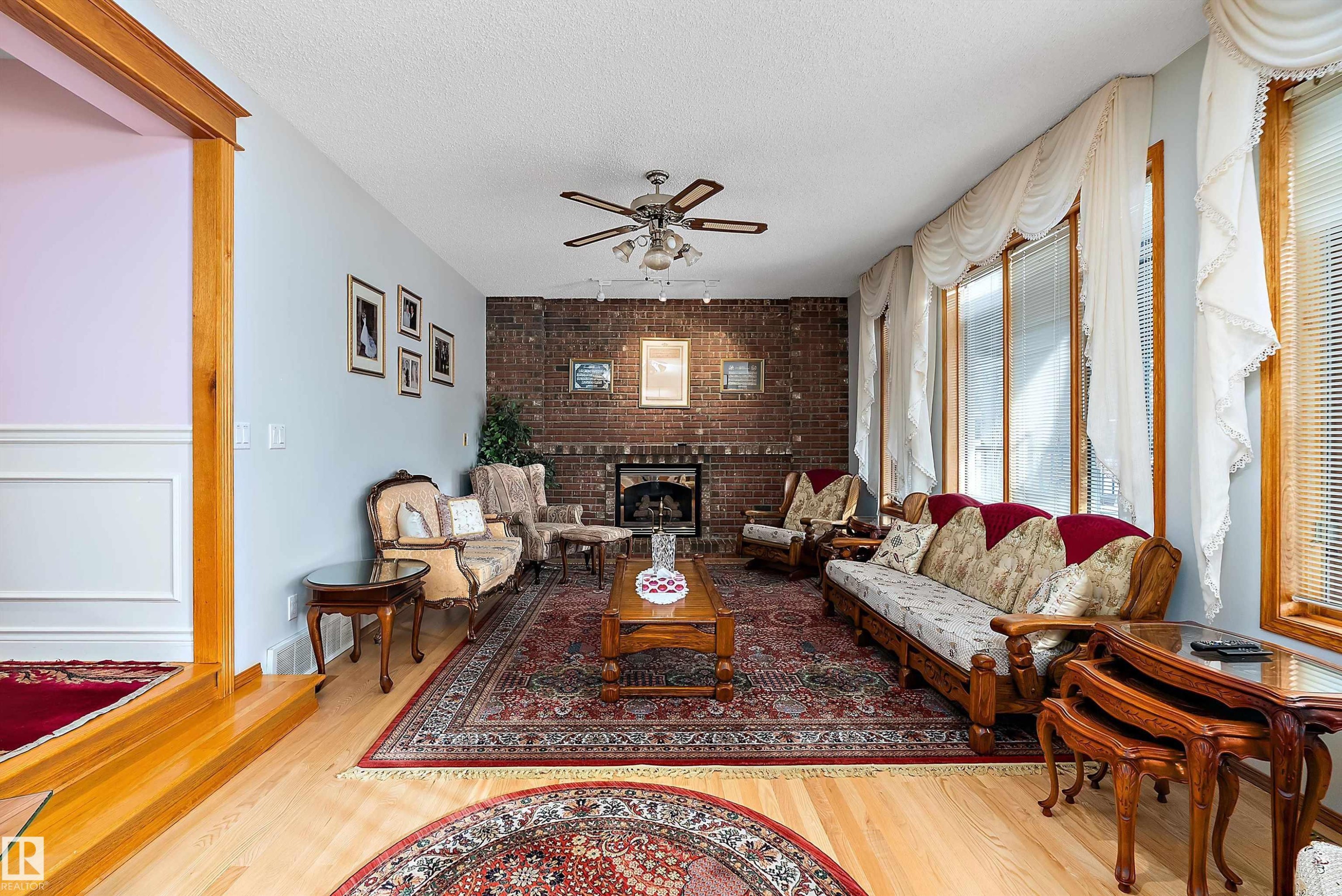 93 Cormack Crescent, Edmonton, AB - Indoor Photo Showing Living Room With Fireplace