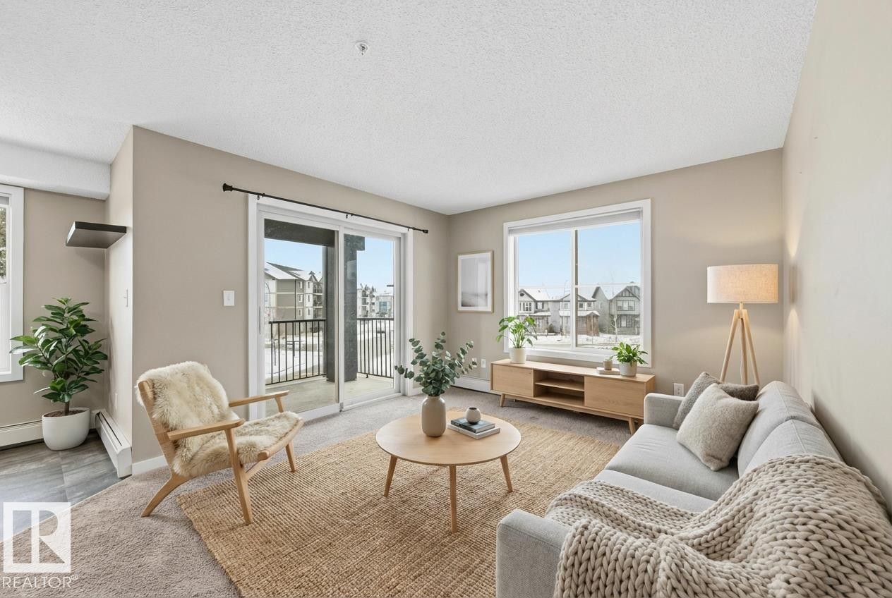 221 1070 Mcconachie Boulevard, Edmonton, AB - Indoor Photo Showing Living Room