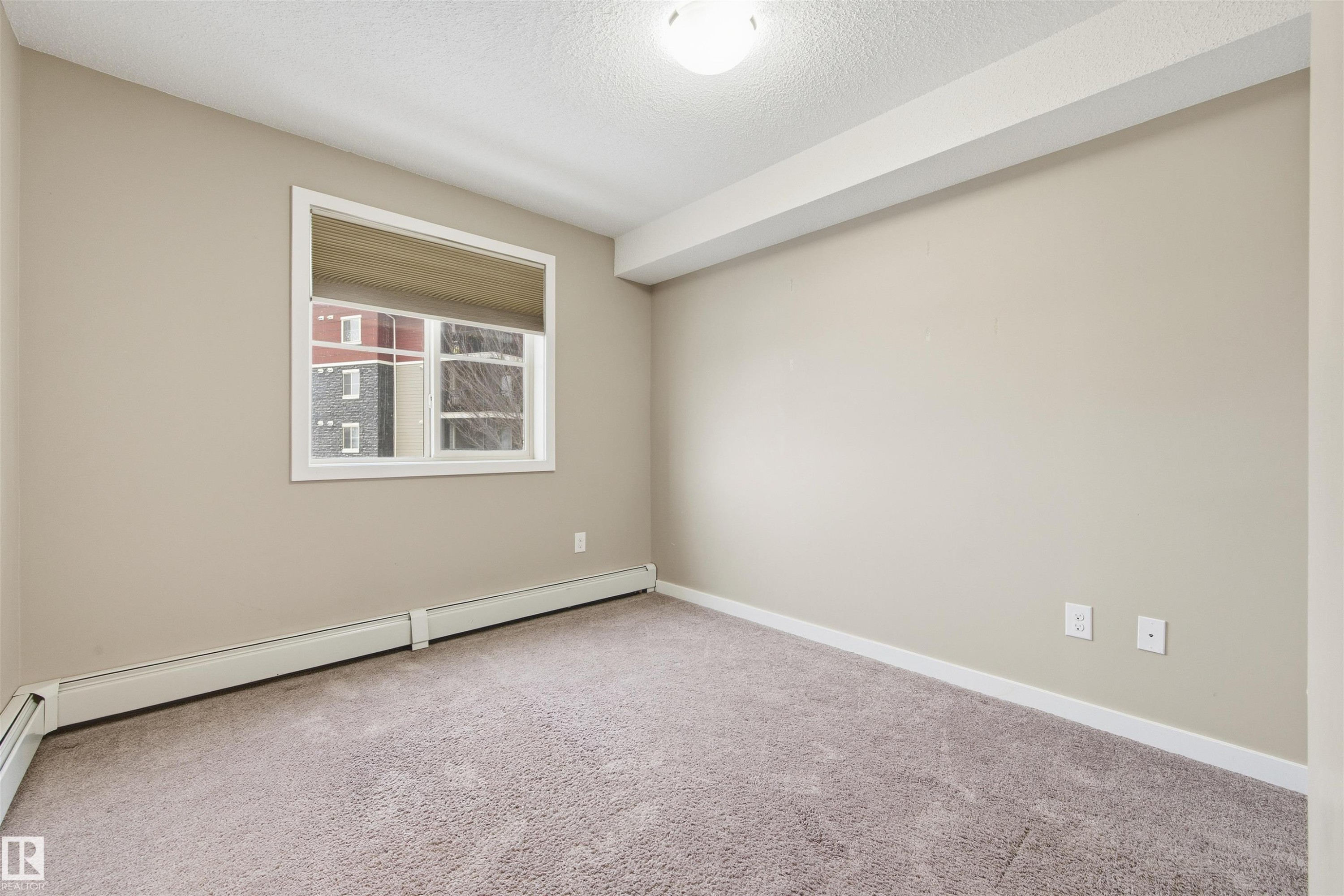 221 1070 Mcconachie Boulevard, Edmonton, AB - Indoor Photo Showing Other Room