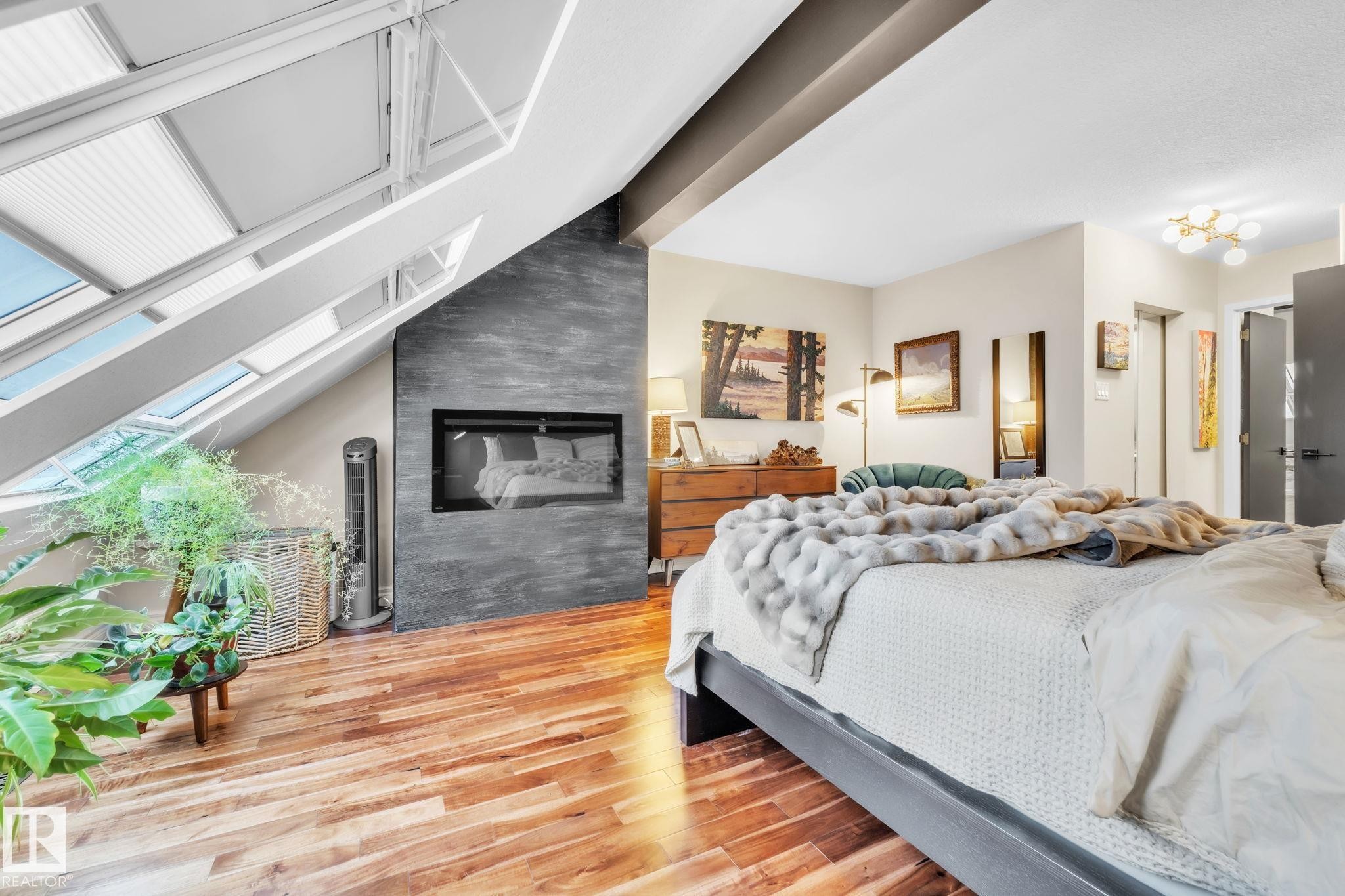 39 500 Lessard Drive, Edmonton, AB - Indoor Photo Showing Bedroom With Fireplace