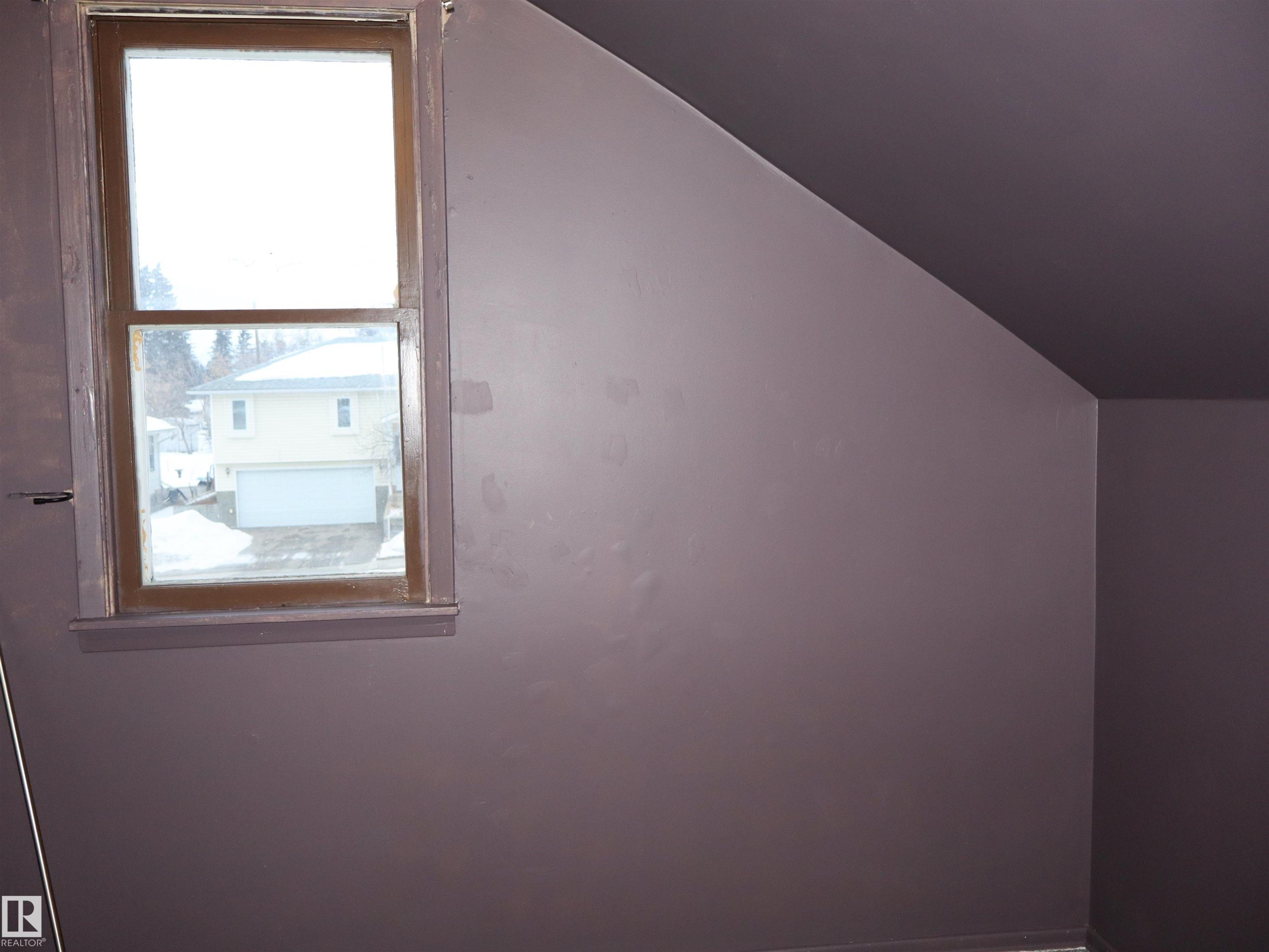 Additional living space featuring vaulted ceiling - 4511 53 Ave, Barrhead, AB - Indoor Photo Showing Other Room