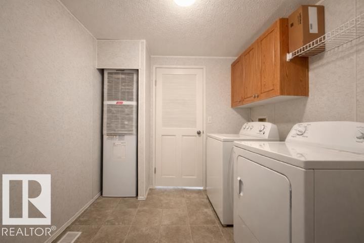 4805 49 Avenue, Wetaskiwin, AB - Indoor Photo Showing Laundry Room