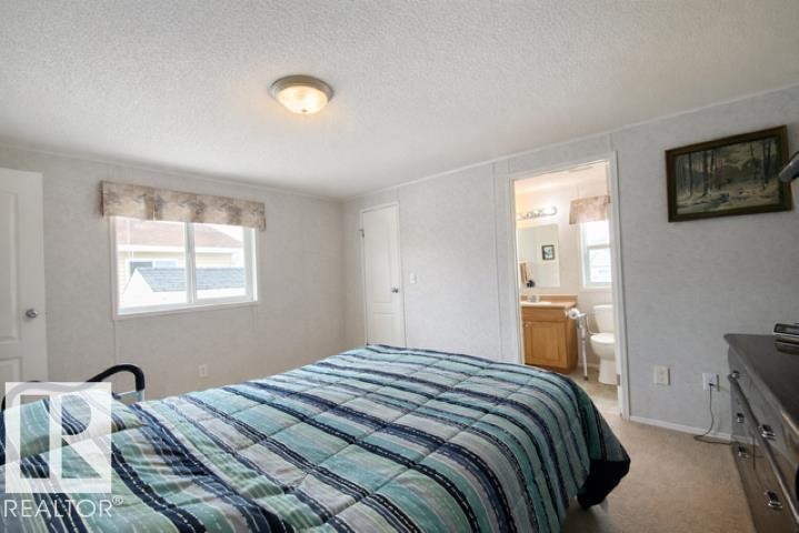 4805 49 Avenue, Wetaskiwin, AB - Indoor Photo Showing Bedroom
