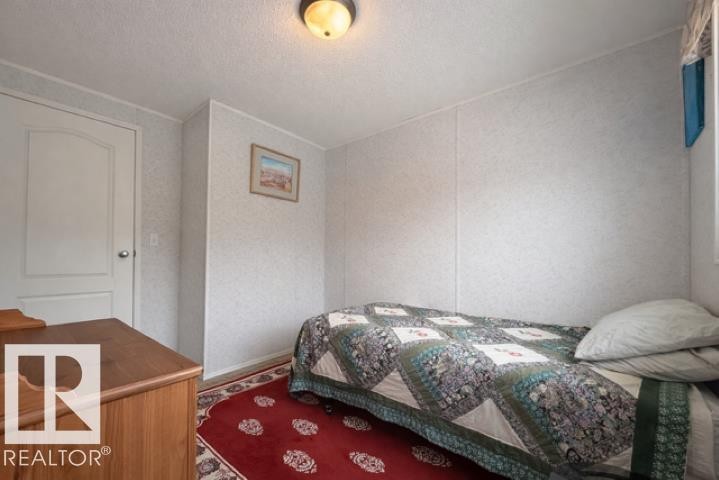 4805 49 Avenue, Wetaskiwin, AB - Indoor Photo Showing Bedroom