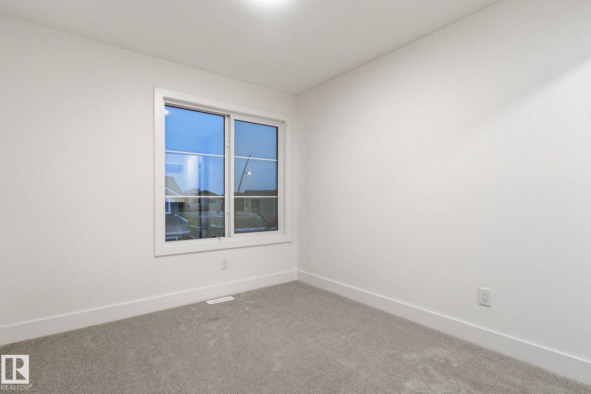 Spare room with baseboards and carpet floors - 2532 210 Street, Edmonton, AB - Indoor Photo Showing Other Room