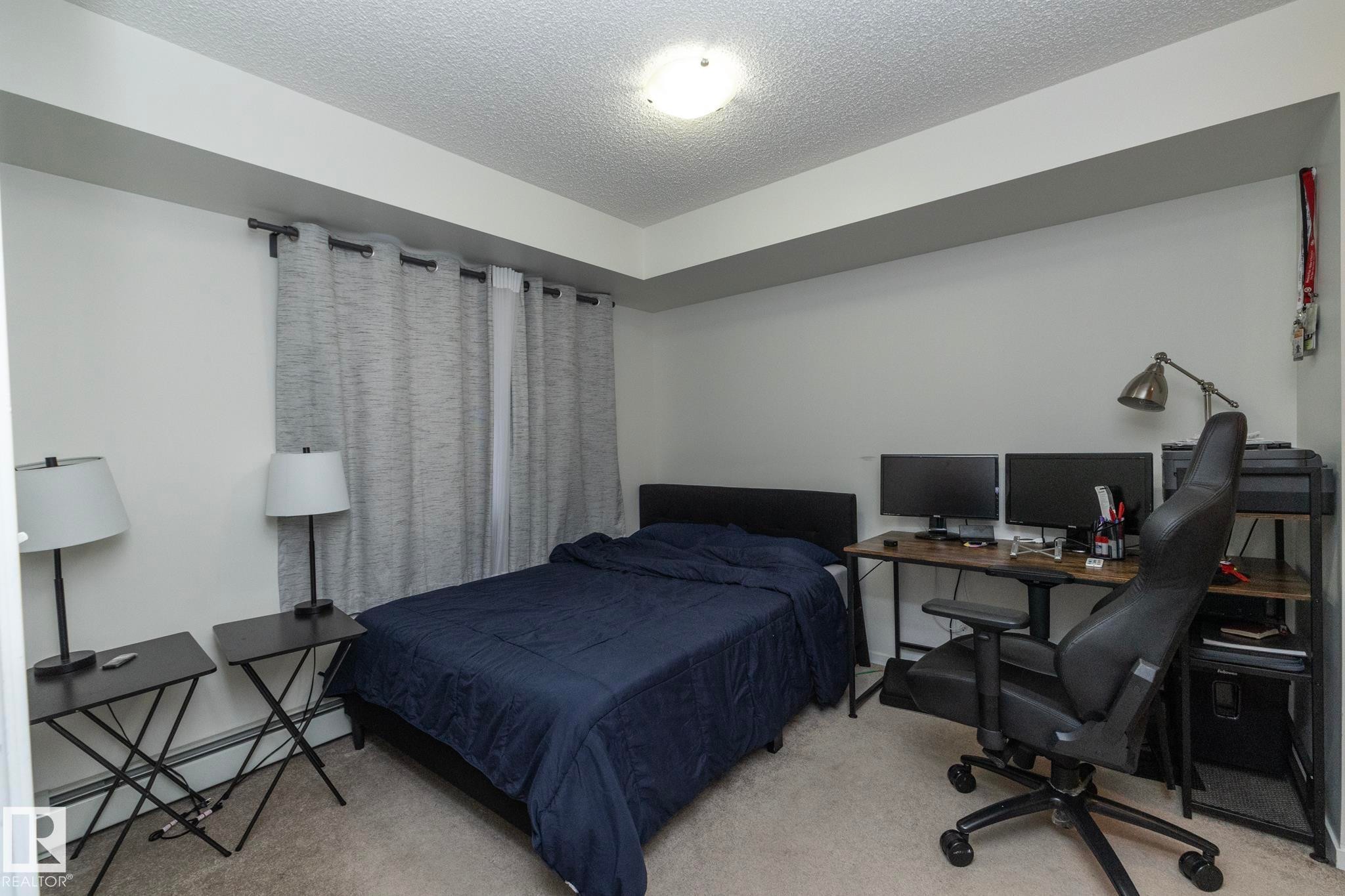 215 5810 Mullen Place, Edmonton, AB - Indoor Photo Showing Bedroom