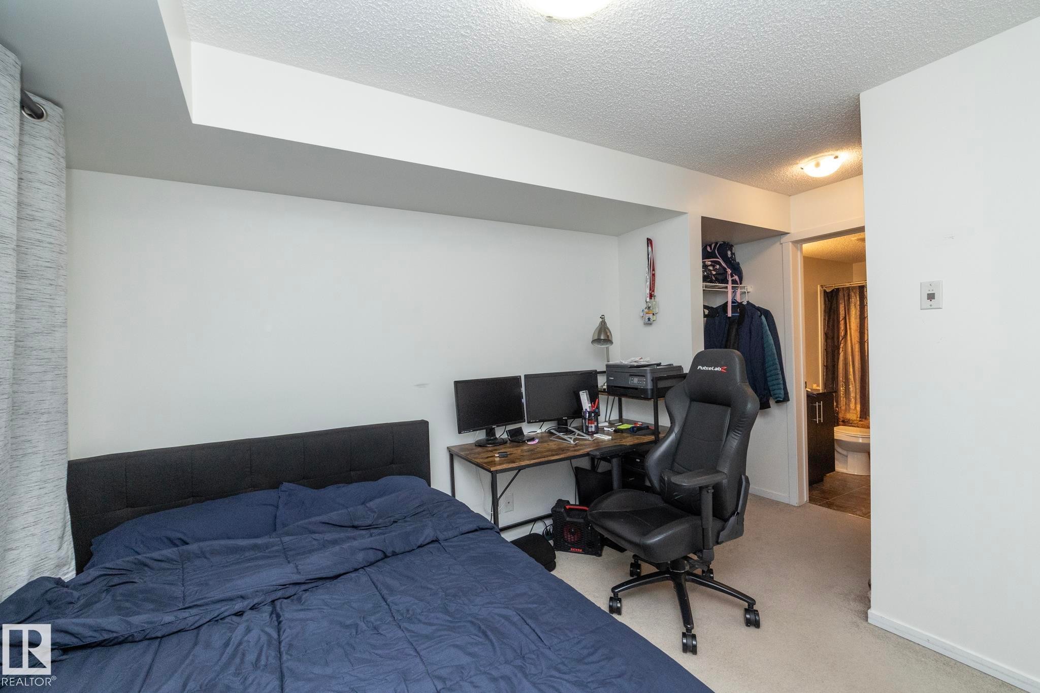 215 5810 Mullen Place, Edmonton, AB - Indoor Photo Showing Bedroom
