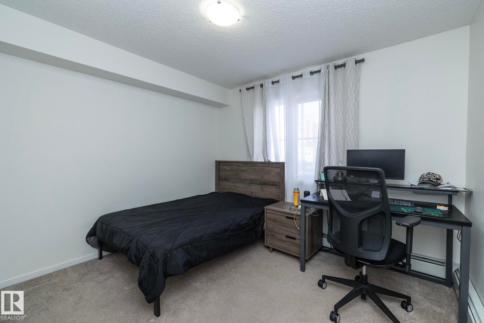 215 5810 Mullen Place, Edmonton, AB - Indoor Photo Showing Bedroom