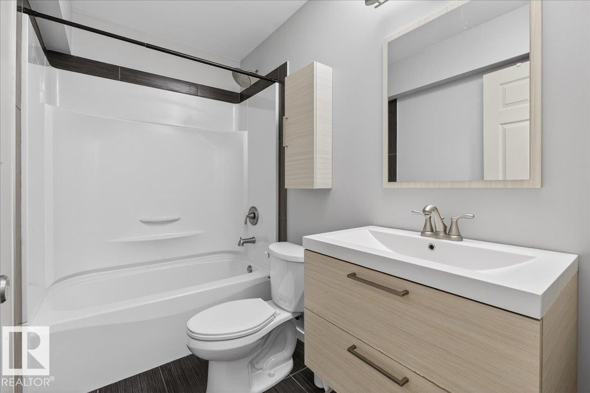Full bathroom with vanity and shower / bathtub combination - 3623 13 Street, Edmonton, AB - Indoor Photo Showing Bathroom