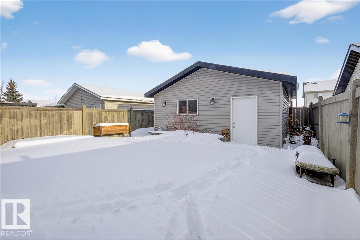 Snow covered property with a fenced backyard - 3623 13 Street, Edmonton, AB - Outdoor With Exterior