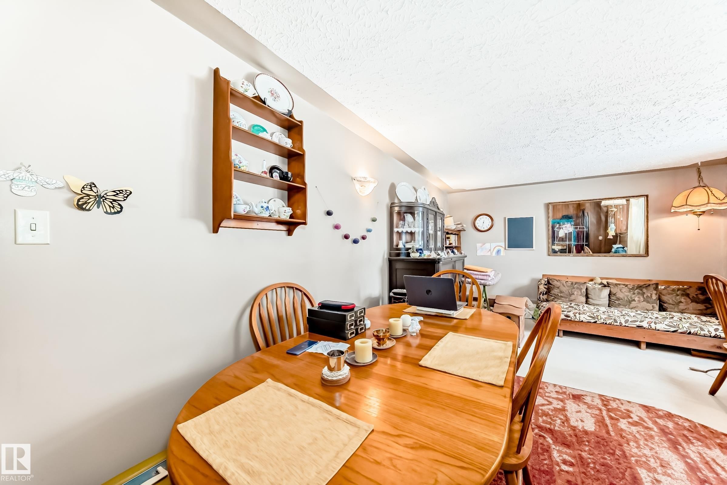 Dining area featuring a textured ceiling - 12028 87 Street, Edmonton, AB - Indoor