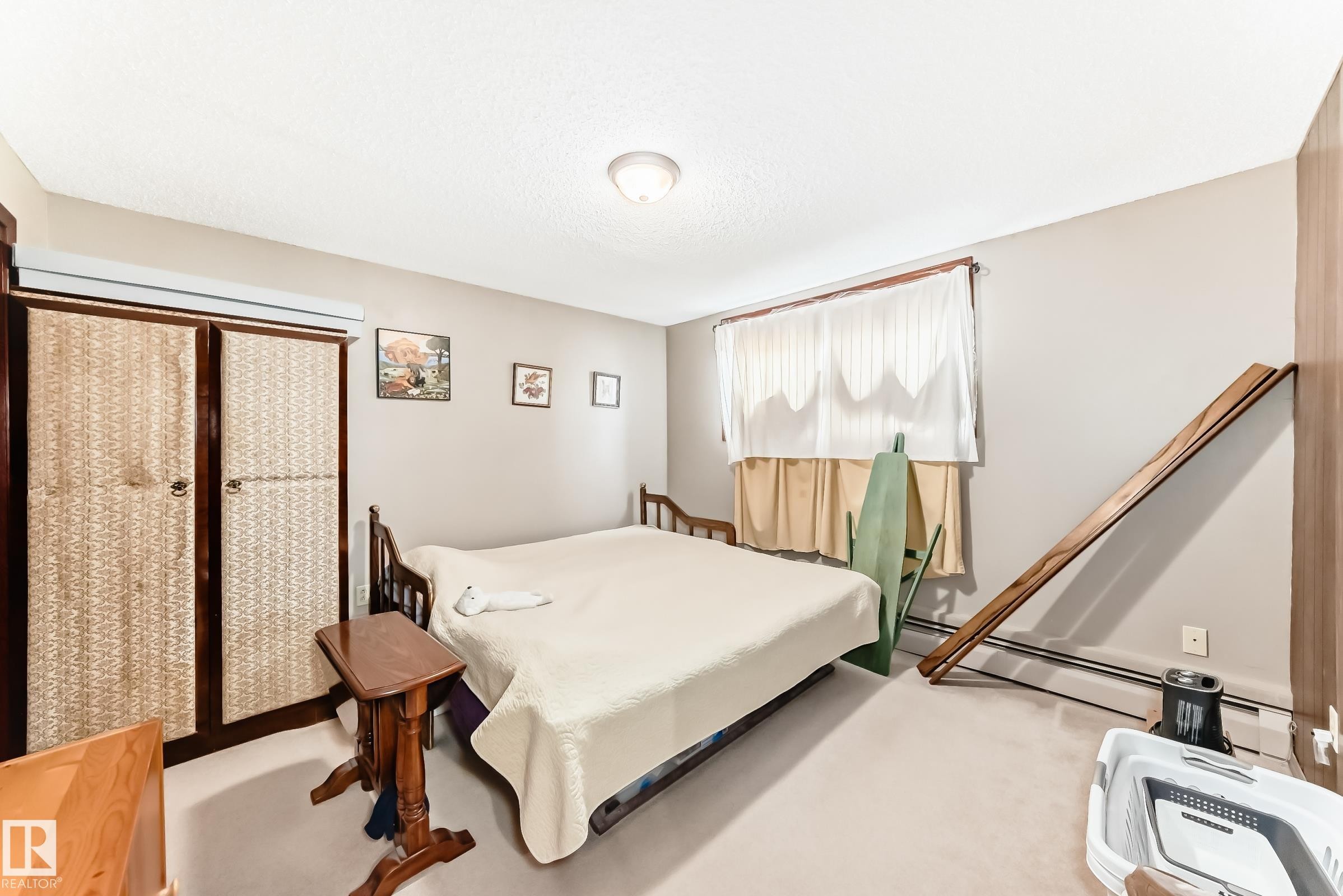 Bedroom with carpet floors - 12028 87 Street, Edmonton, AB - Indoor Photo Showing Bedroom