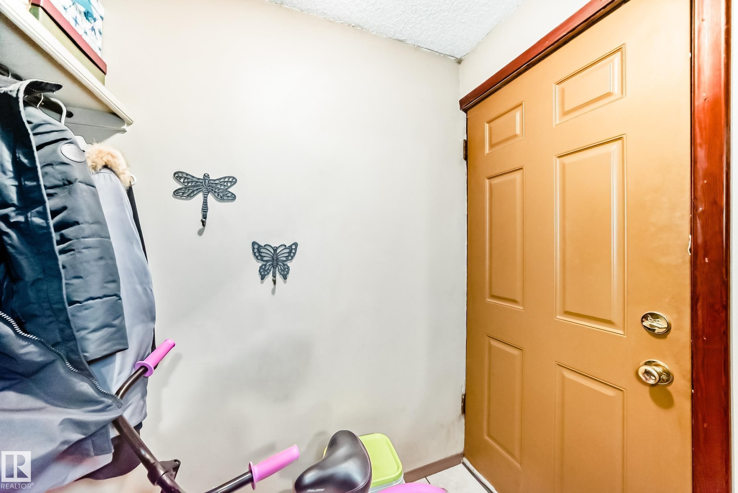 Workout room with a textured ceiling - 12028 87 Street, Edmonton, AB - Indoor Photo Showing Other Room