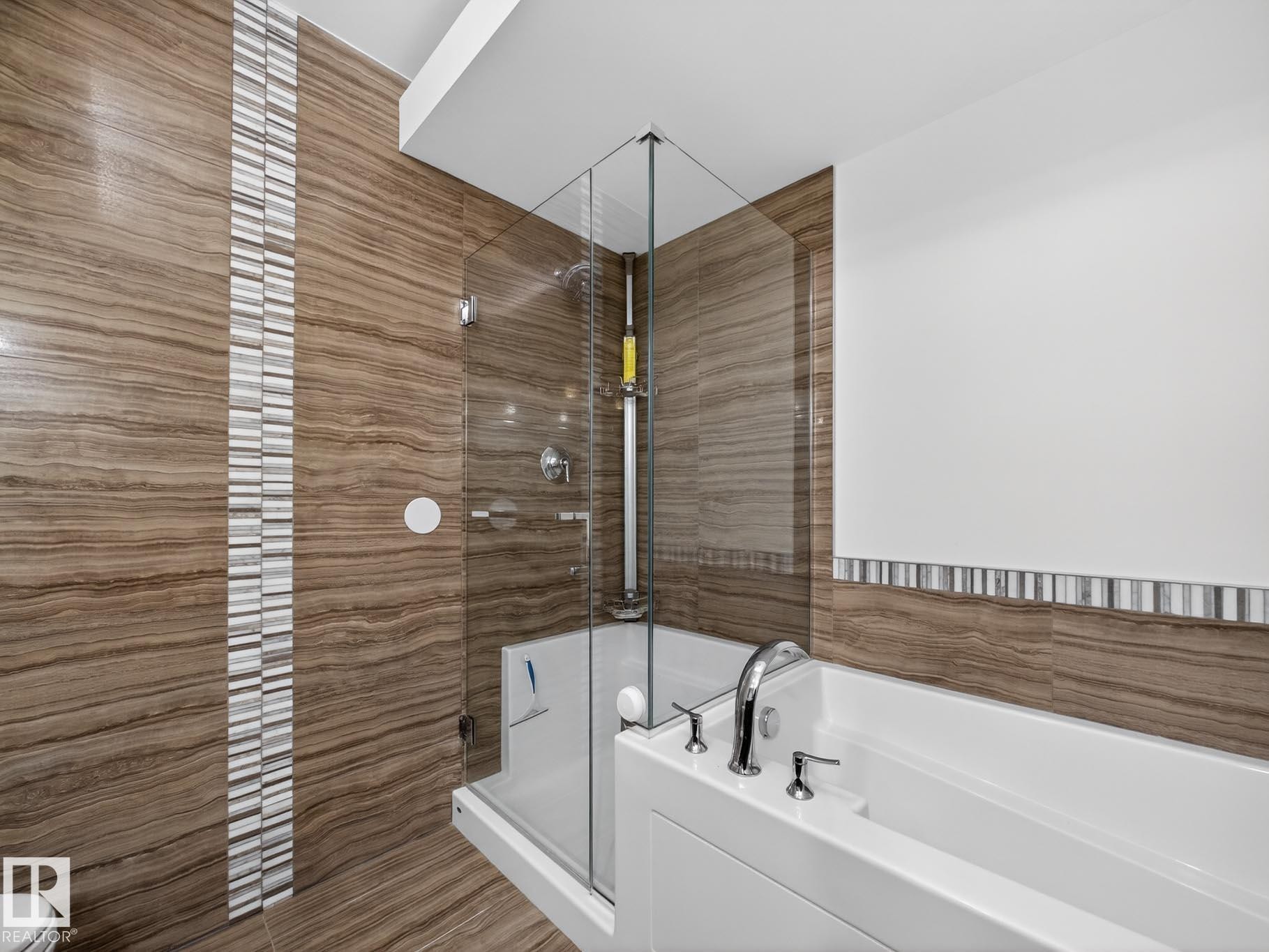 Full bathroom with a garden tub, a stall shower, and tile walls - #902 11969 Jasper Av Nw, Edmonton, AB - Indoor Photo Showing Bathroom