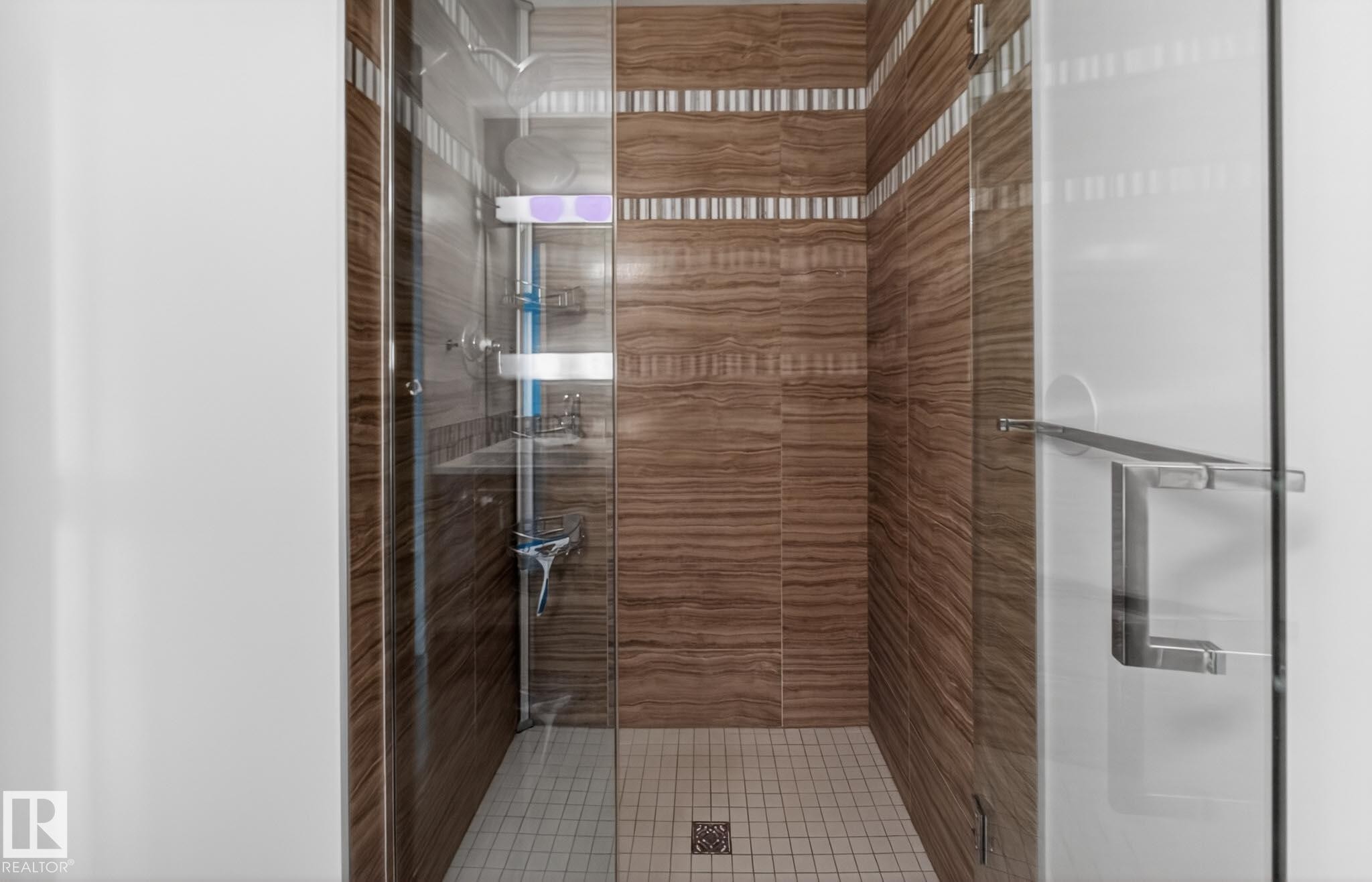 Bathroom featuring a stall shower - #902 11969 Jasper Av Nw, Edmonton, AB - Indoor Photo Showing Bathroom