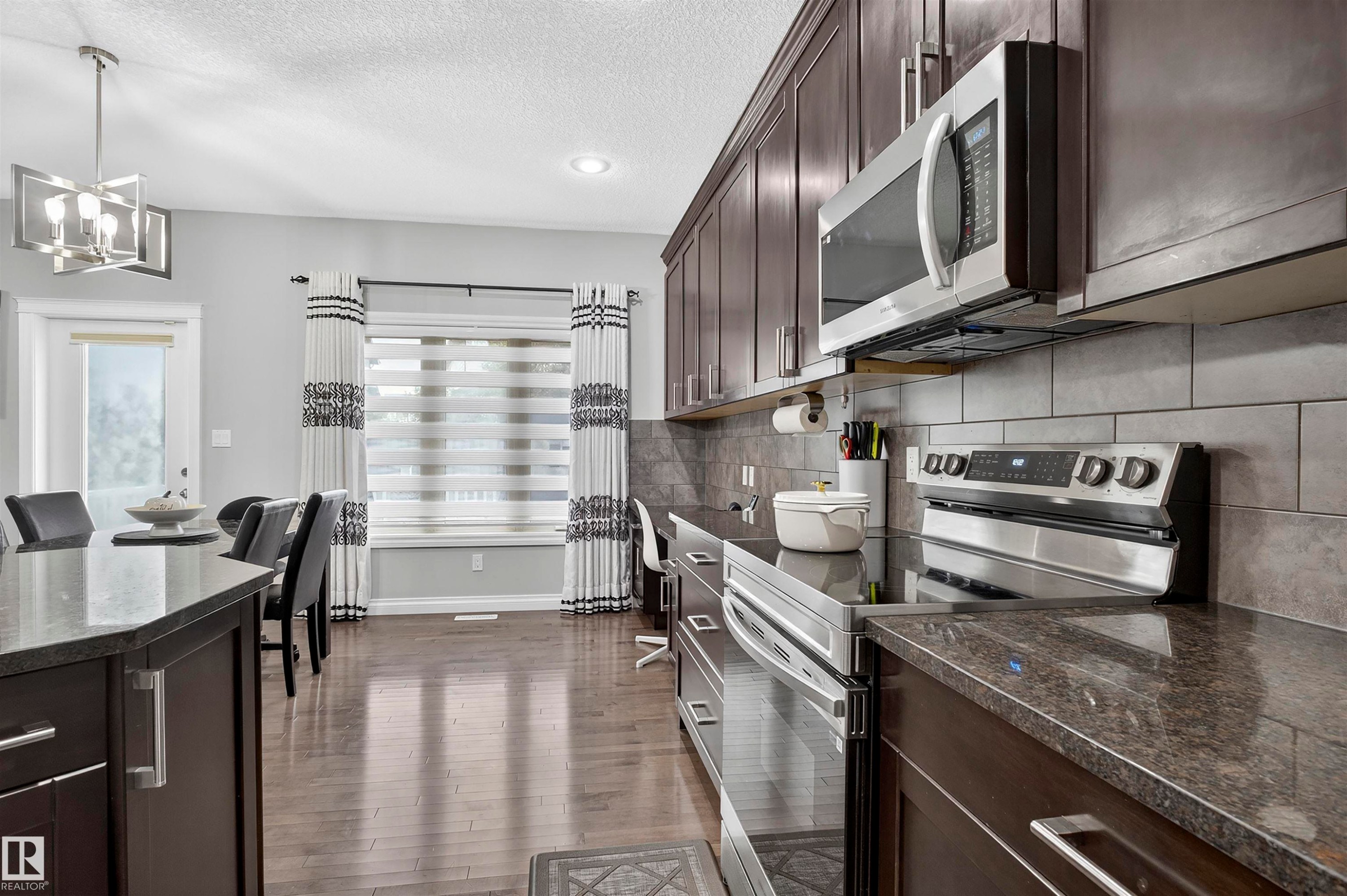 SS Appliances - 618 Adams Way Sw, Edmonton, AB - Indoor Photo Showing Kitchen With Upgraded Kitchen