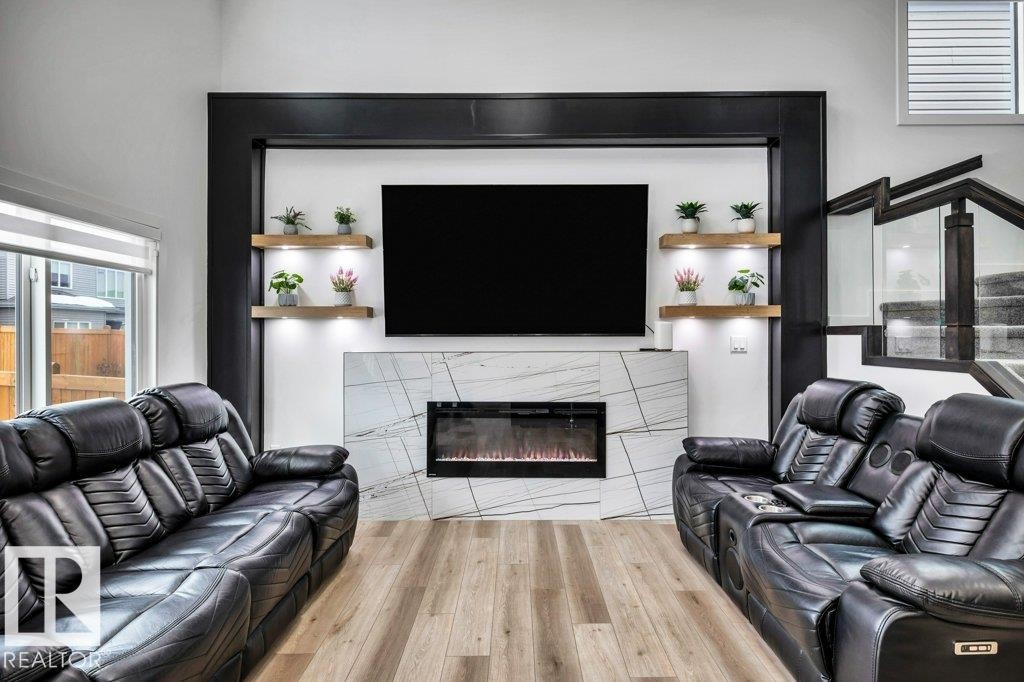 5320 Kimball Place, Edmonton, AB - Indoor Photo Showing Living Room With Fireplace