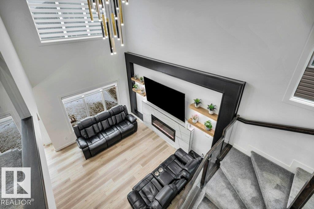 5320 Kimball Place, Edmonton, AB - Indoor Photo Showing Other Room With Fireplace