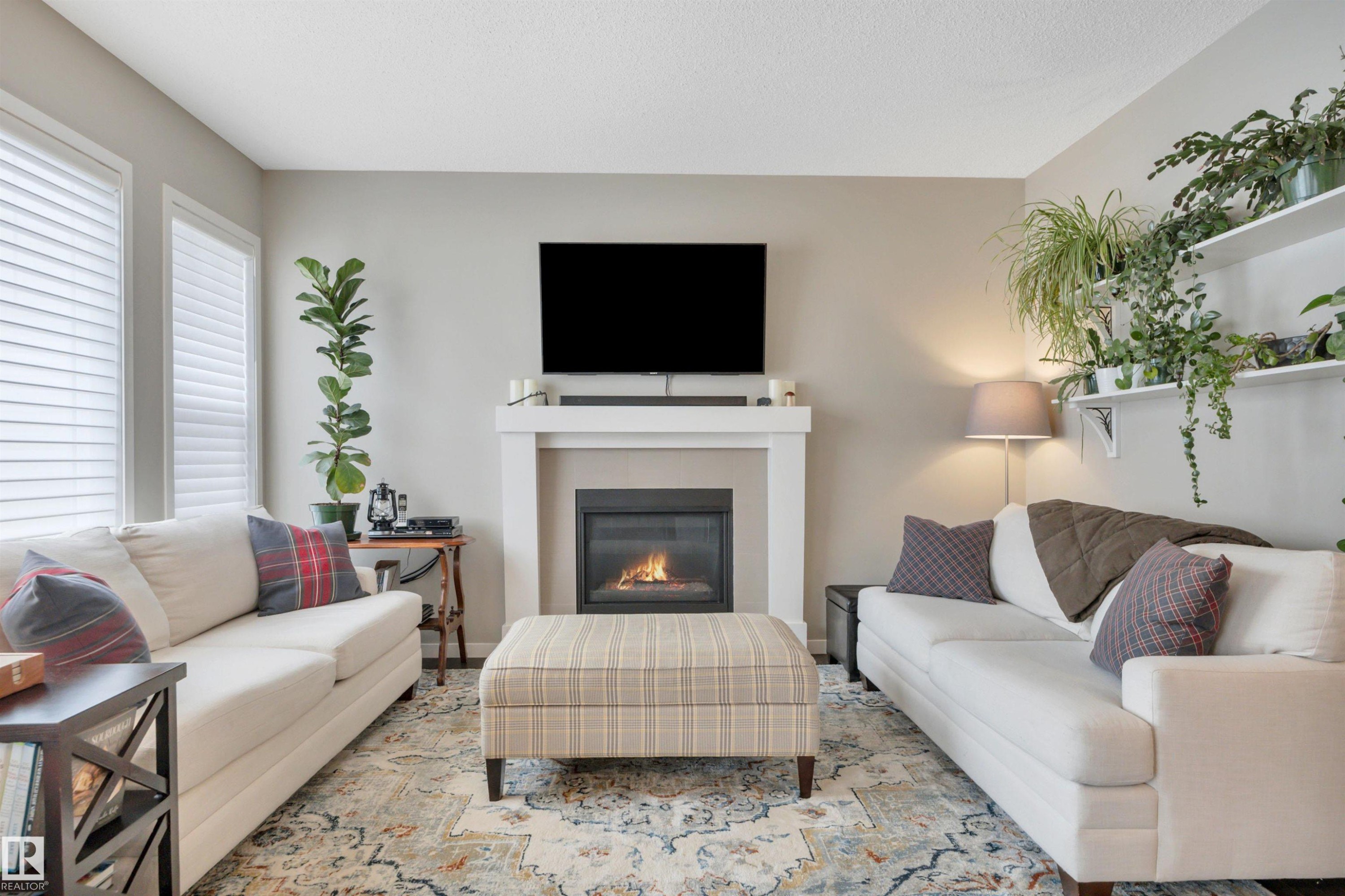 2394 Cassidy Way, Edmonton, AB - Indoor Photo Showing Living Room With Fireplace