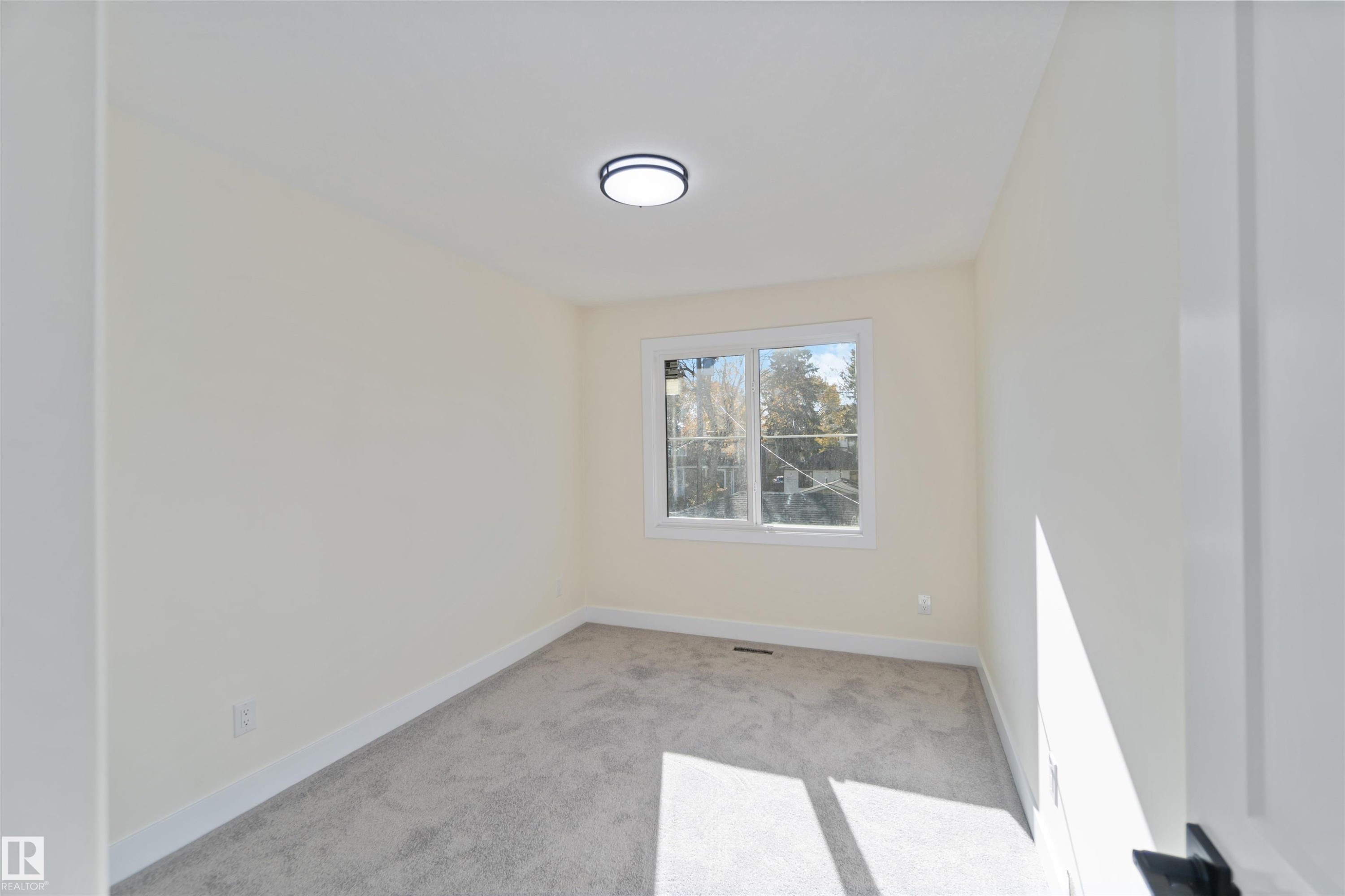 Bedroom 2 9'11"11'x9' - 8319 81Ave, Edmonton, AB - Indoor Photo Showing Other Room