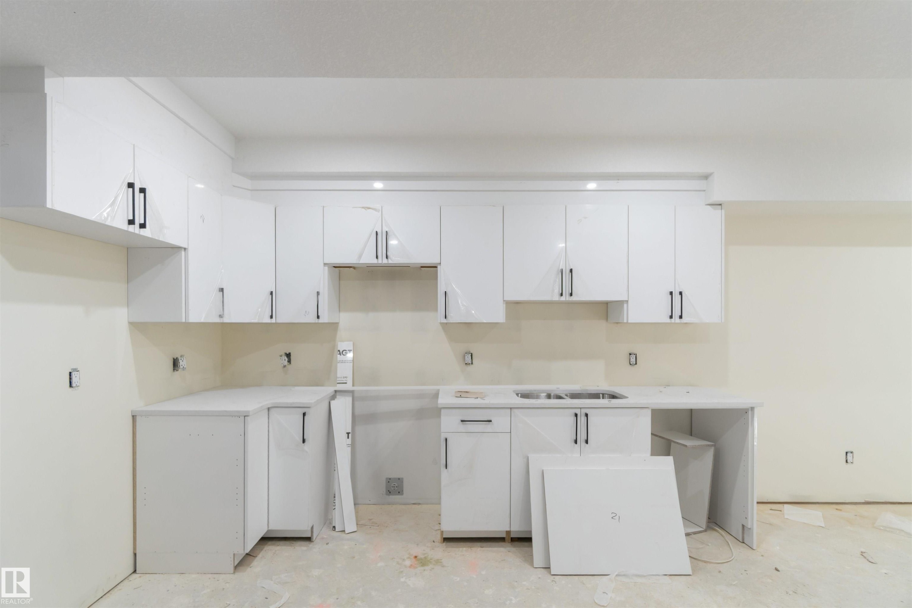 Legal suite - 8319 81Ave, Edmonton, AB - Indoor Photo Showing Kitchen With Double Sink