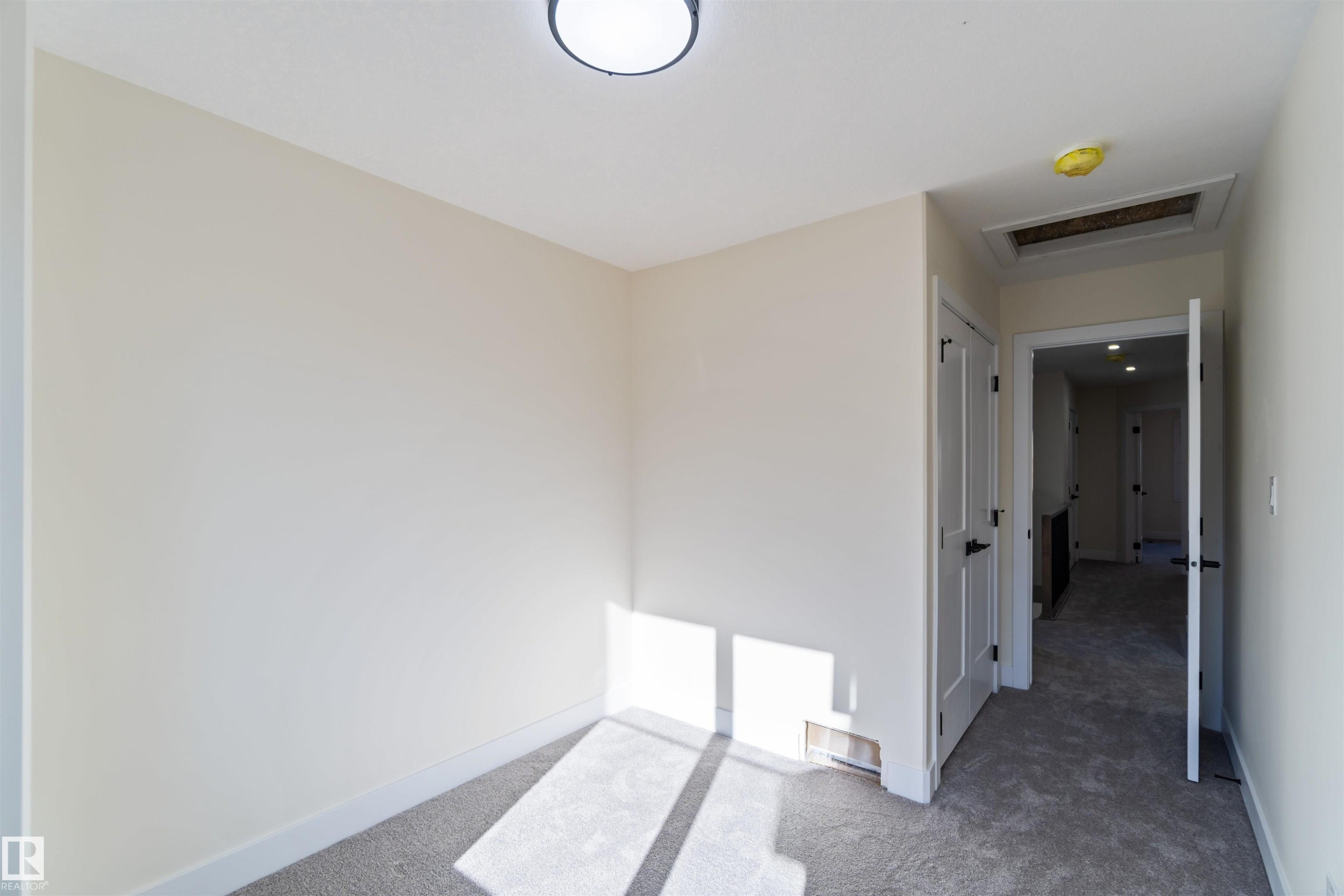 Legal suite bedroom 1 9'x9'11" - 8319 81Ave, Edmonton, AB - Indoor Photo Showing Other Room