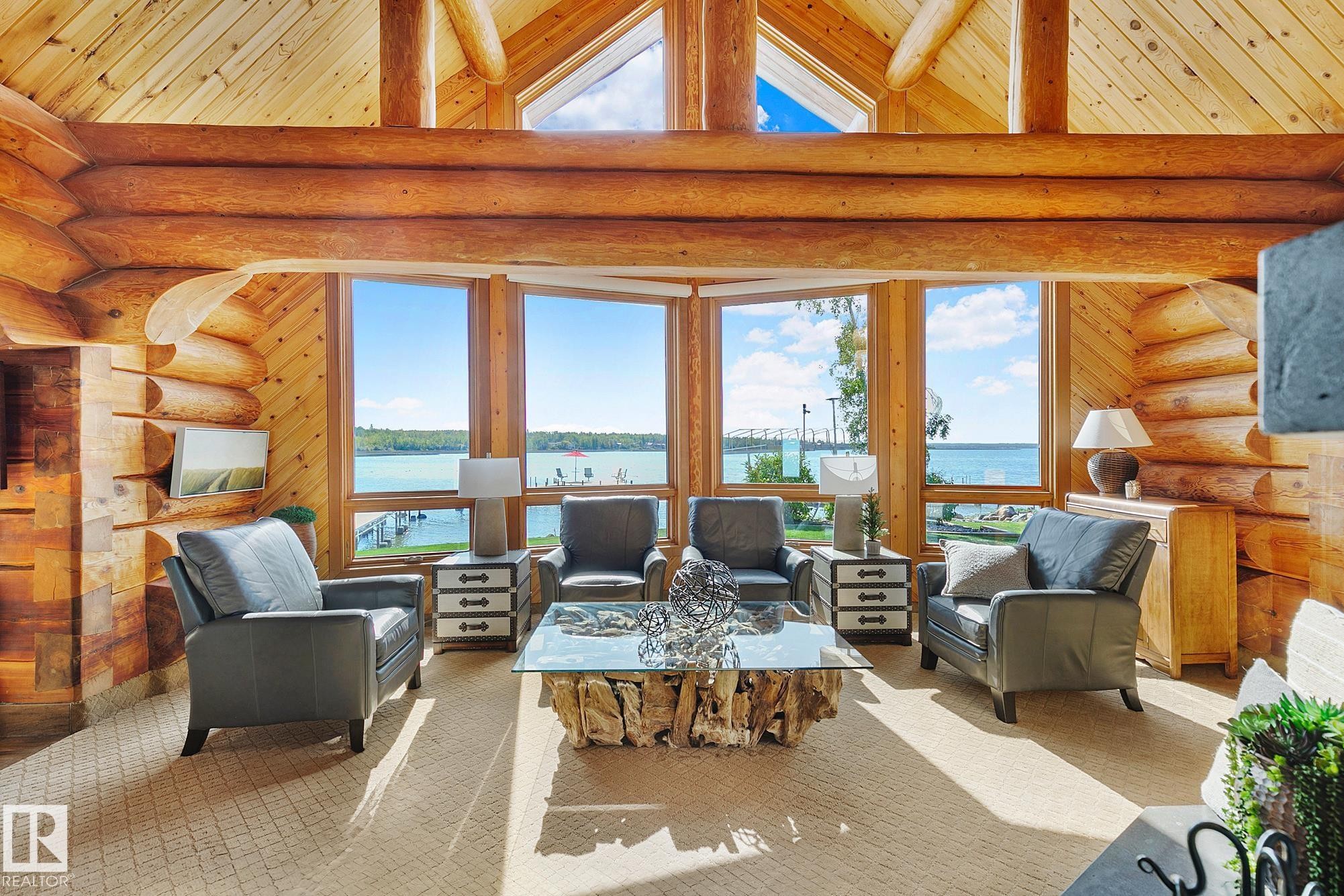 #1 Martin Road, Rural Lac Ste. Anne County, AB - Indoor Photo Showing Living Room With Fireplace