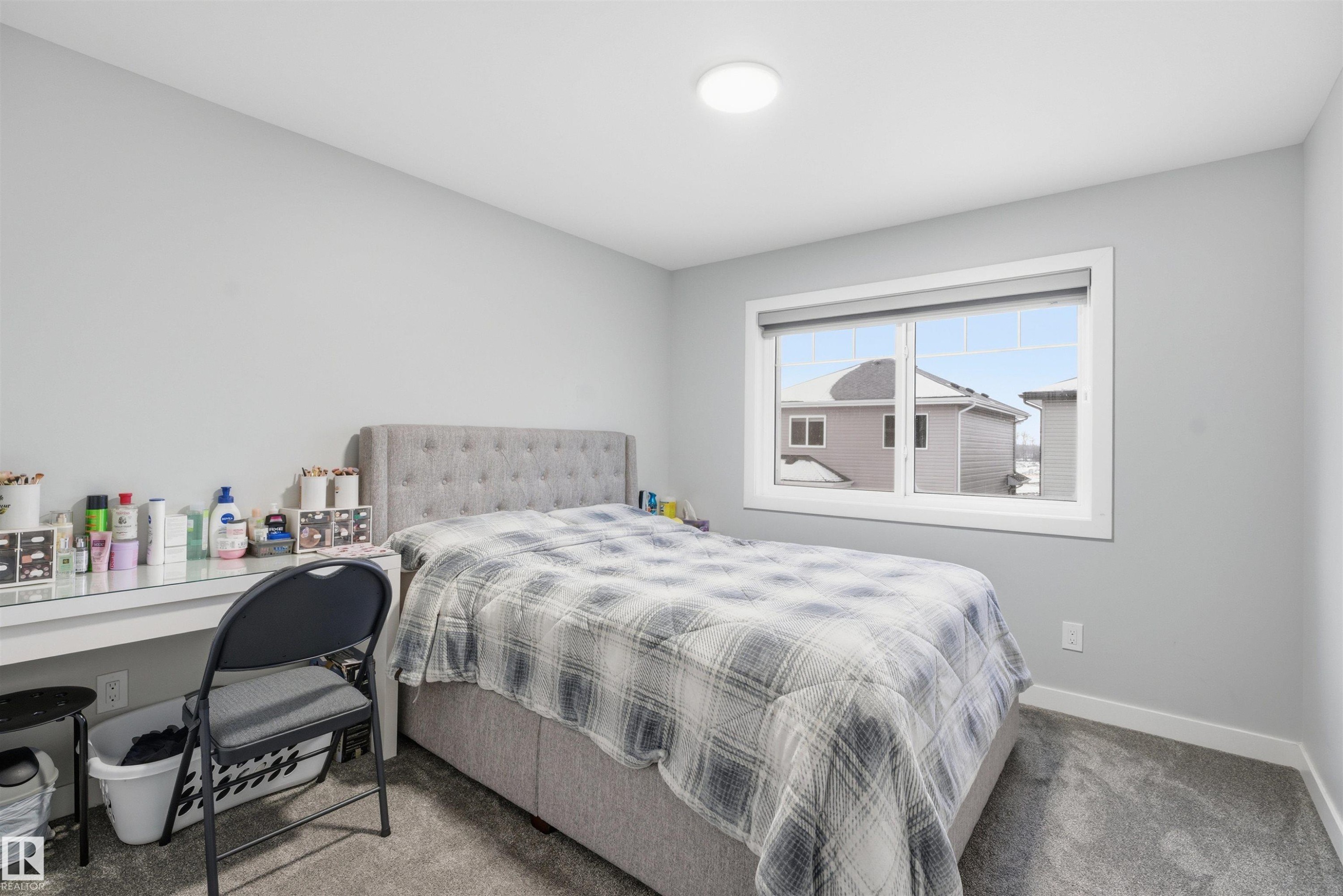 Bedroom featuring carpet and baseboards - 452 Roberts Crescent, Leduc, AB - Indoor Photo Showing Bedroom