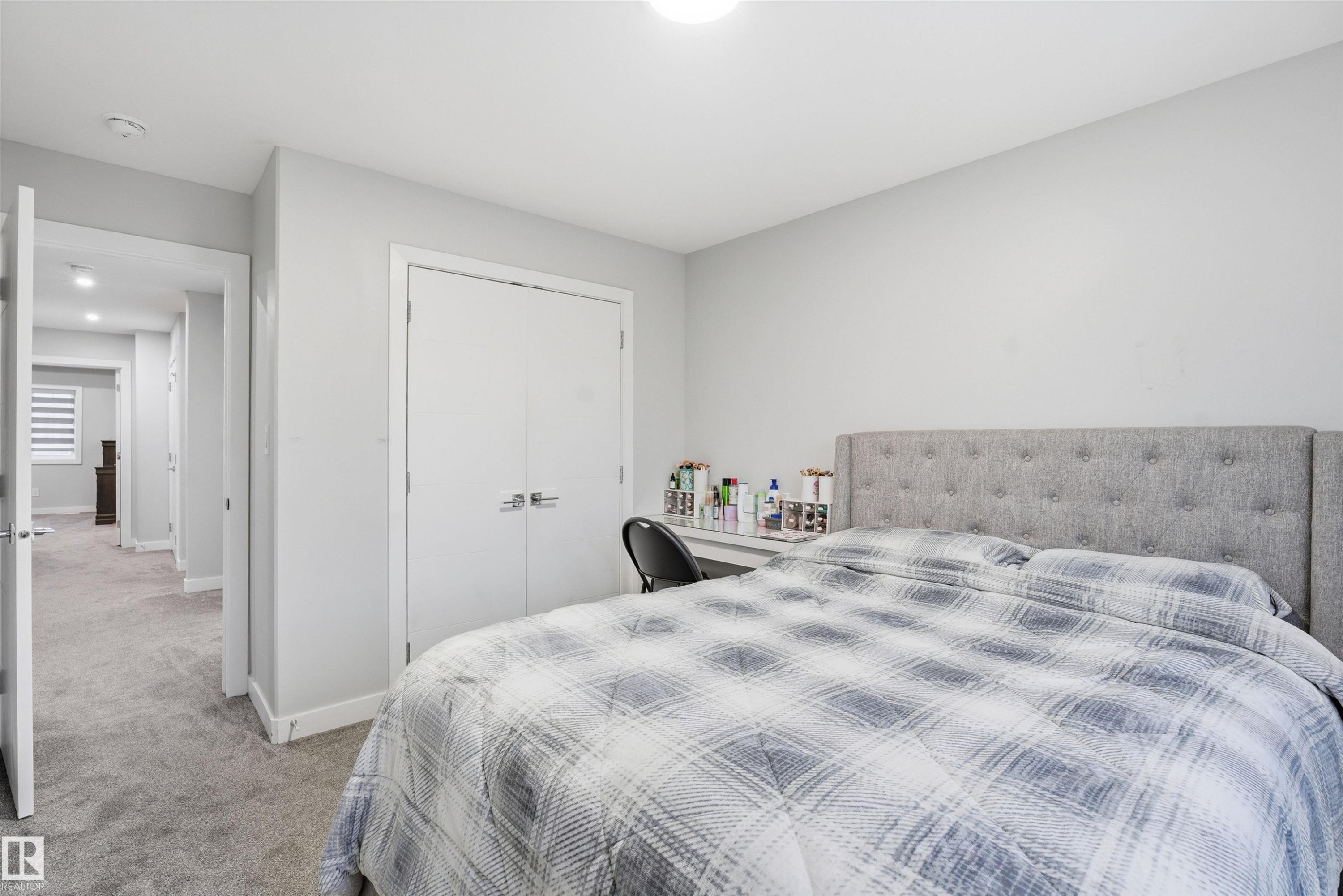 Bedroom featuring light colored carpet and a closet - 452 Roberts Crescent, Leduc, AB - Indoor Photo Showing Bedroom