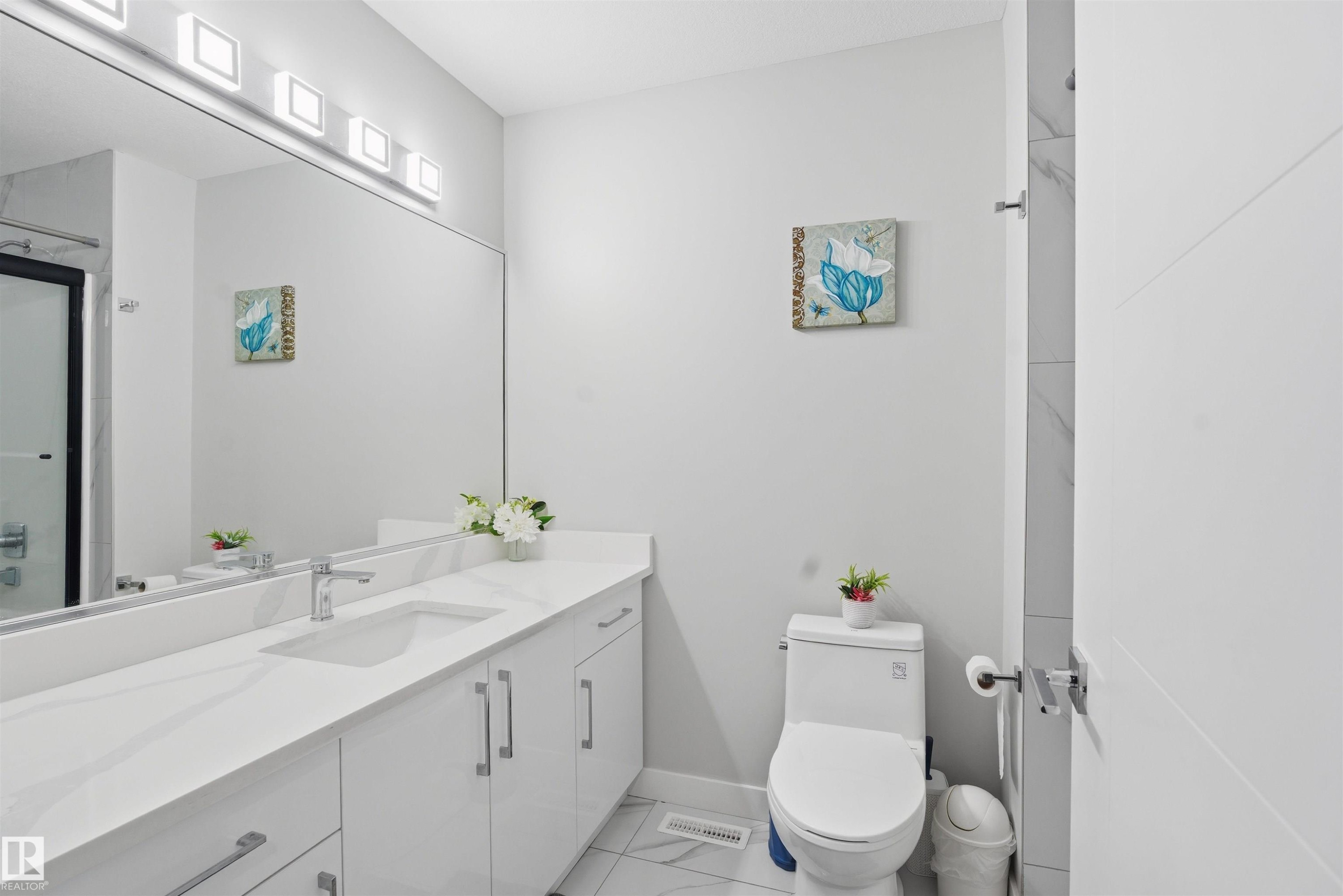 Bathroom featuring vanity and a shower with door - 452 Roberts Crescent, Leduc, AB - Indoor Photo Showing Bathroom