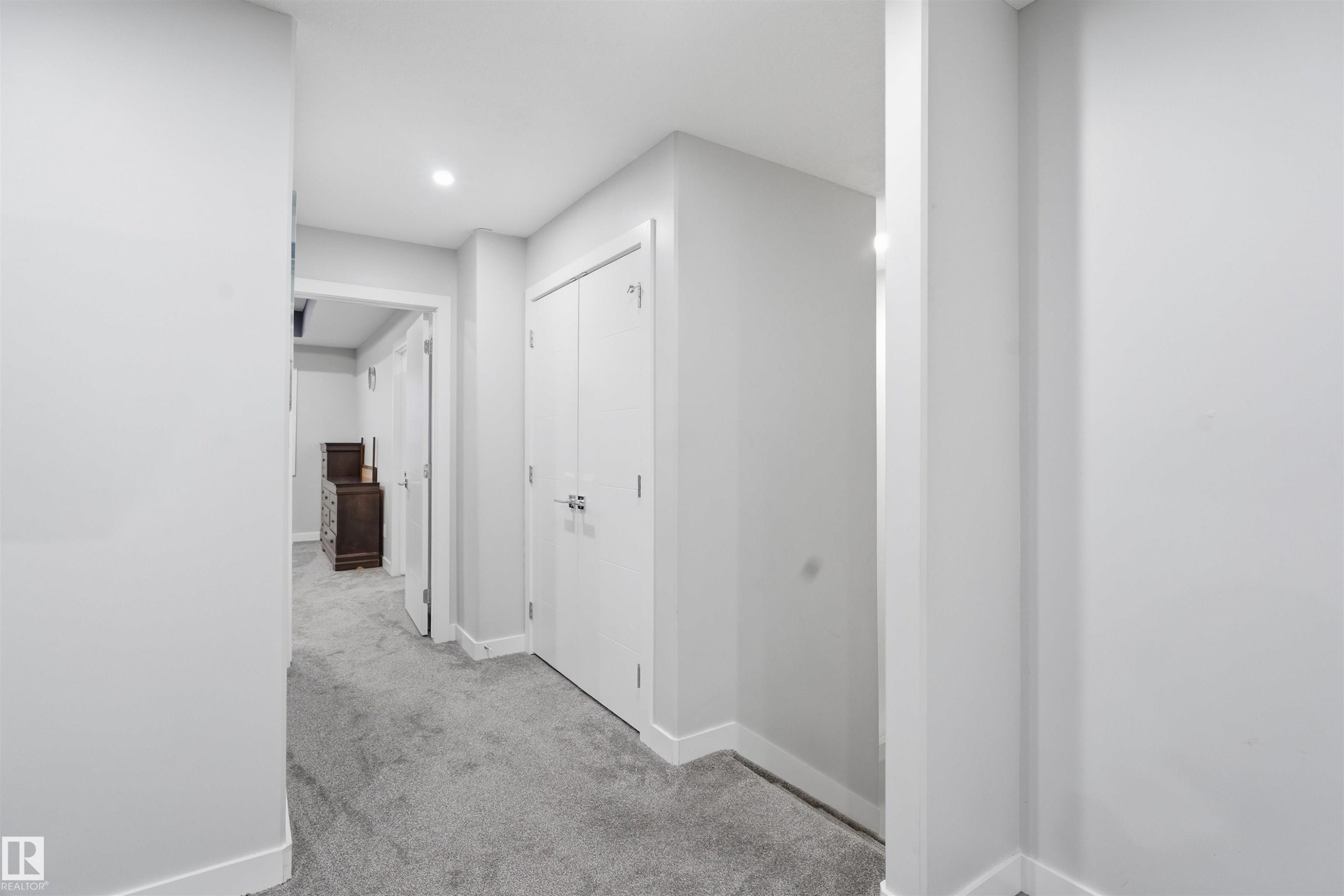 Hall featuring carpet flooring and recessed lighting - 452 Roberts Crescent, Leduc, AB - Indoor Photo Showing Other Room