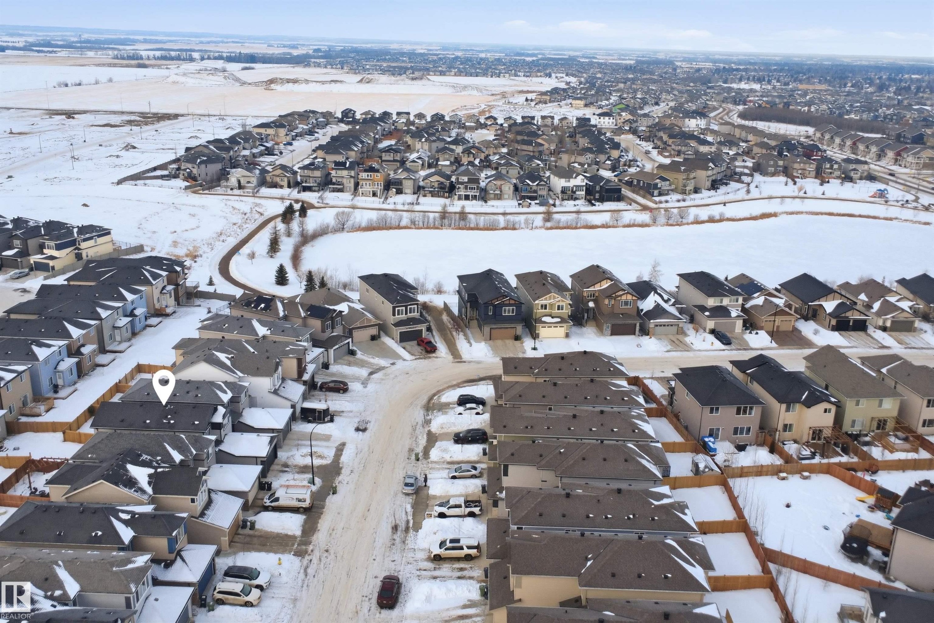 Snowy aerial view with a residential view - 452 Roberts Crescent, Leduc, AB - Outdoor With View