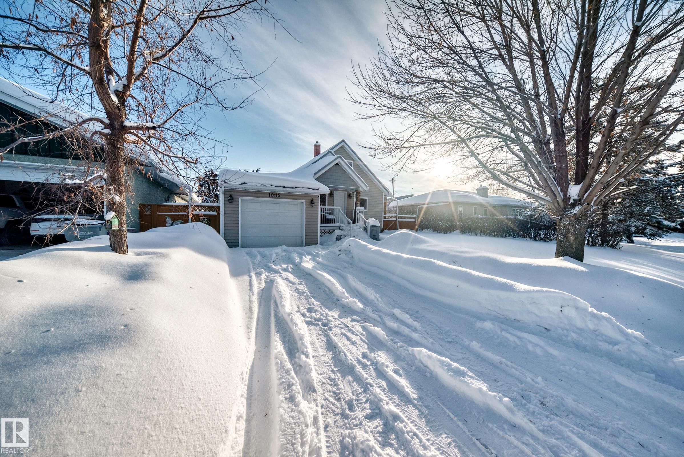 View of front of home featuring a chimney - 10115 104, Westlock, AB - Outdoor
