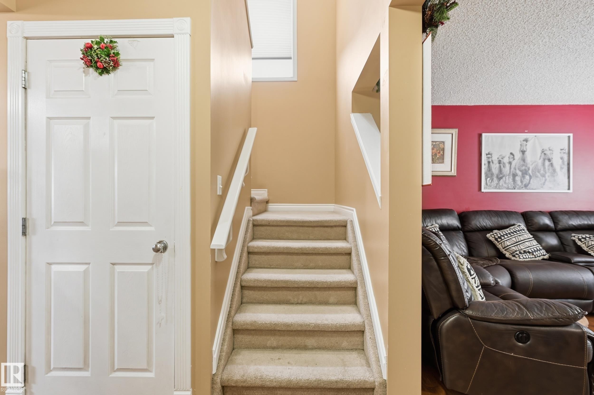 Staircase featuring a textured ceiling and baseboards - 3010 32 Avenue Nw, Edmonton, AB - Indoor Photo Showing Other Room