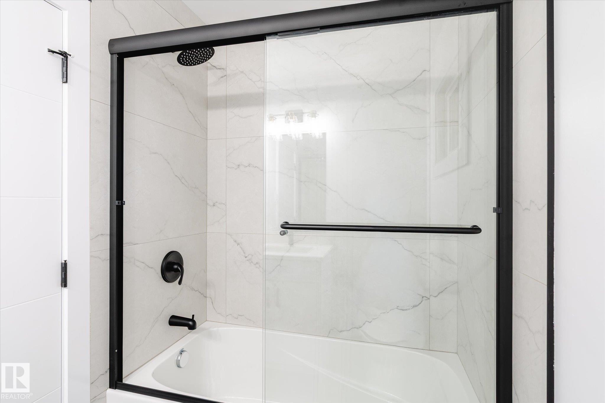 Bathroom with shower / bath combination with glass door - 5105 106A Street, Edmonton, AB - Indoor Photo Showing Bathroom