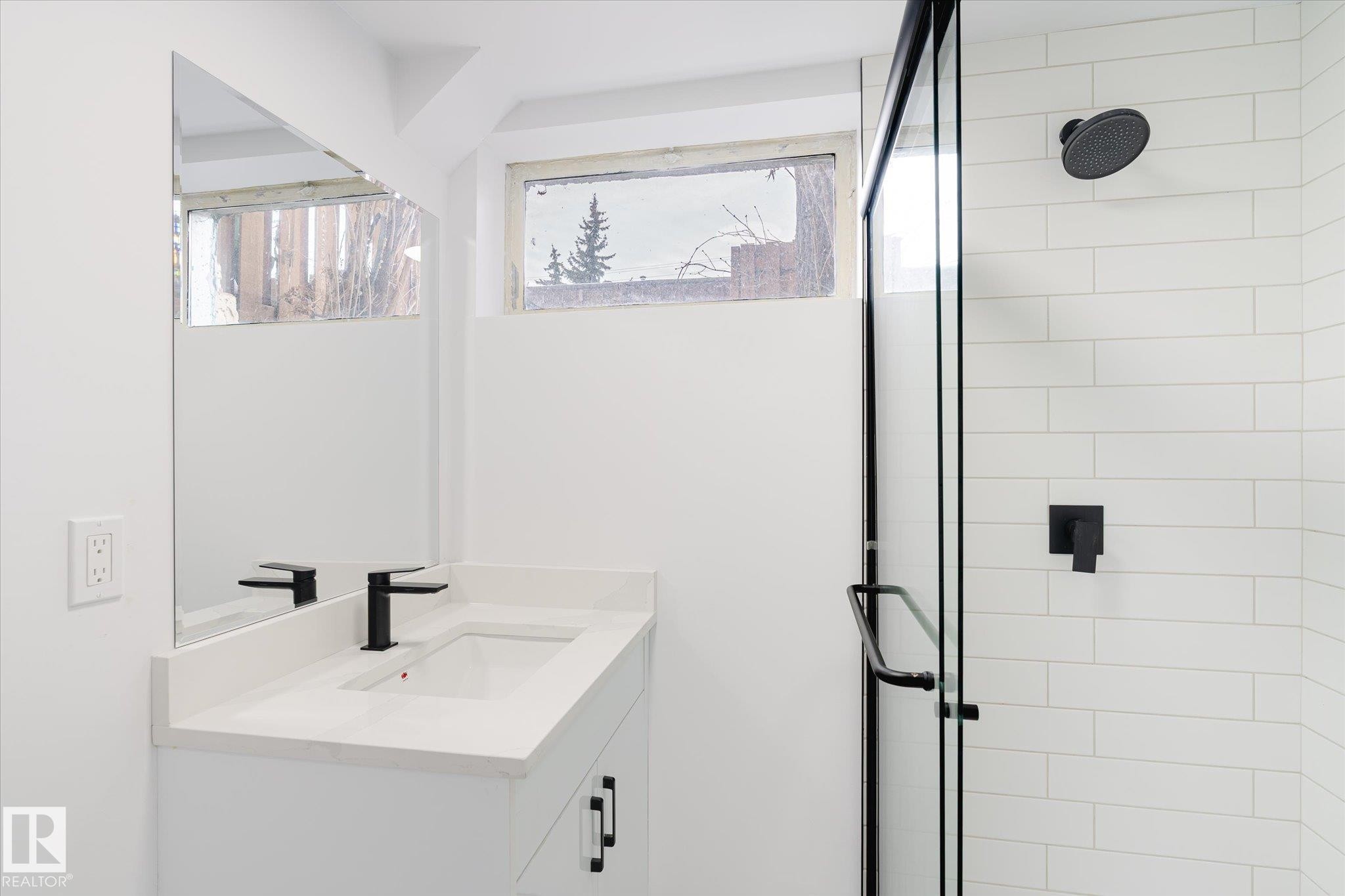 Full bath with a stall shower and vanity - 5105 106A Street, Edmonton, AB - Indoor Photo Showing Bathroom