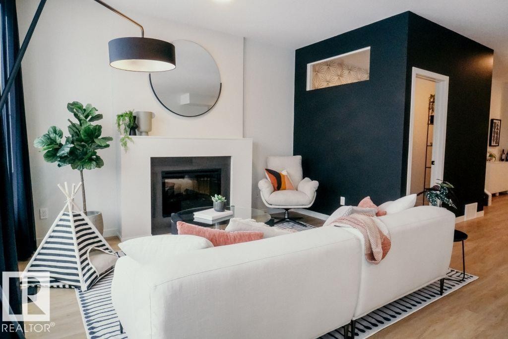 7365 Klapstein Crescent, Edmonton, AB - Indoor Photo Showing Living Room With Fireplace