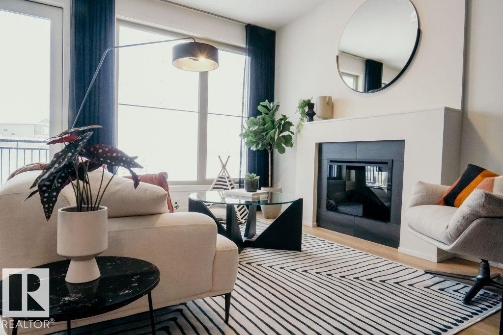 7365 Klapstein Crescent, Edmonton, AB - Indoor Photo Showing Living Room With Fireplace