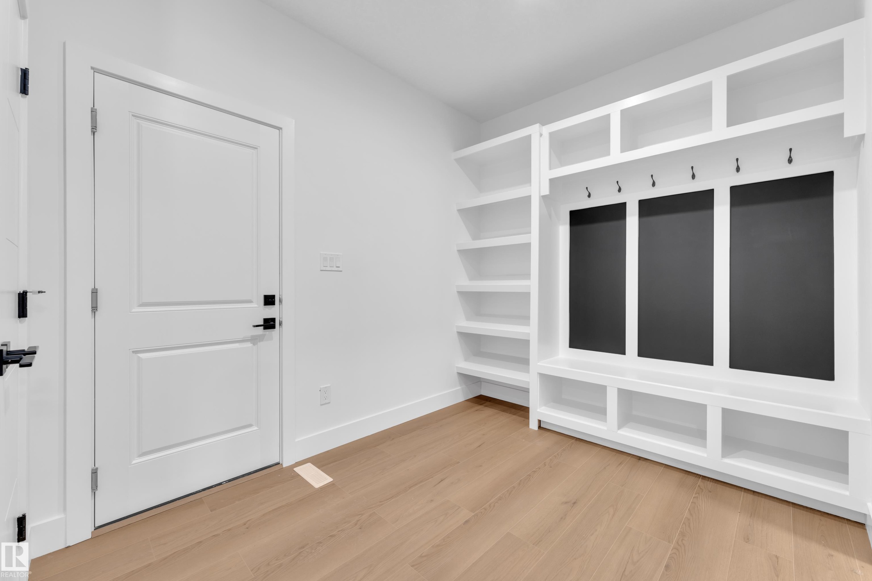Mudroom with light wood-style flooring and baseboards - 733 Astoria Way, Devon, AB - Indoor Photo Showing Other Room