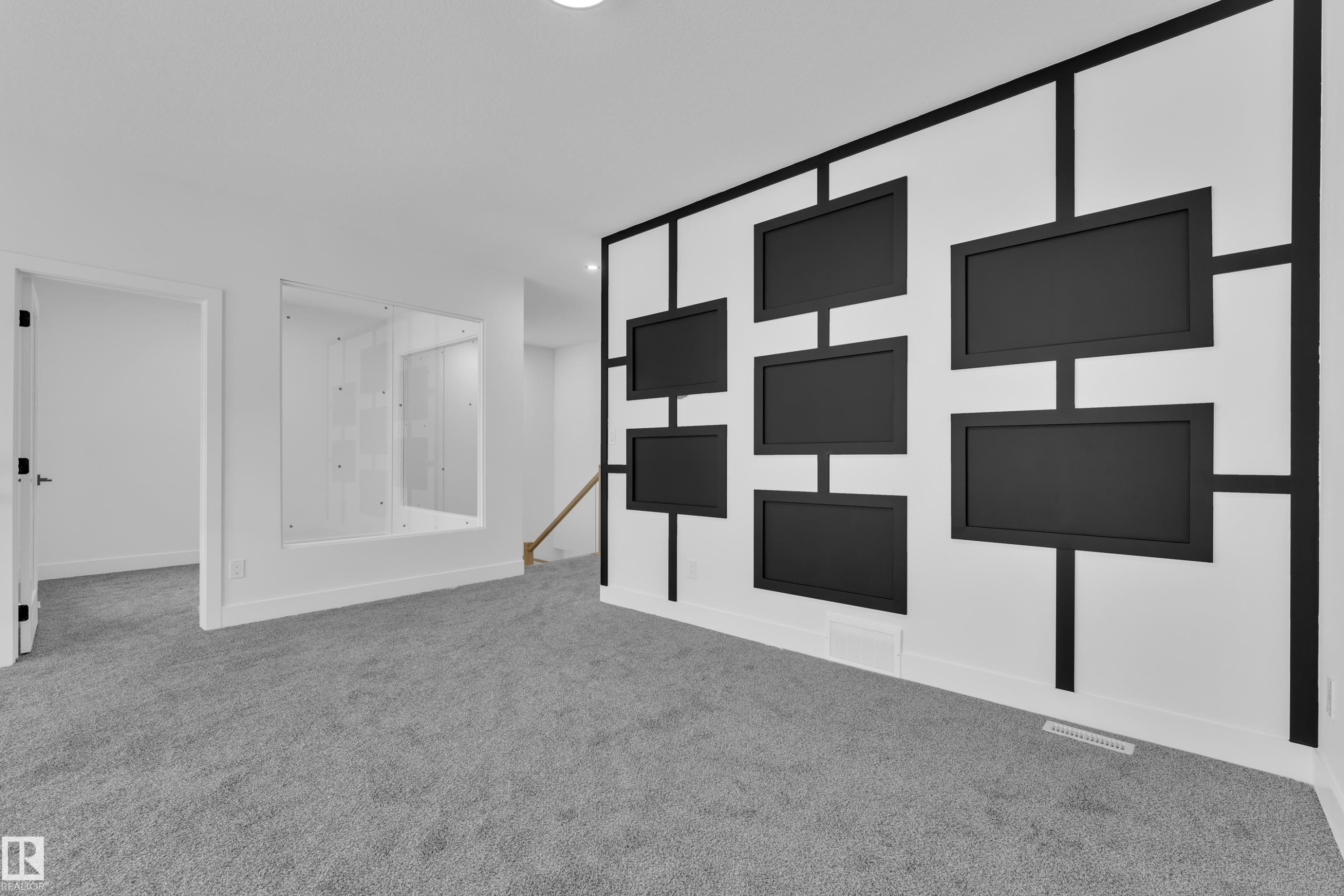 Spare room featuring carpet floors and baseboards - 733 Astoria Way, Devon, AB -