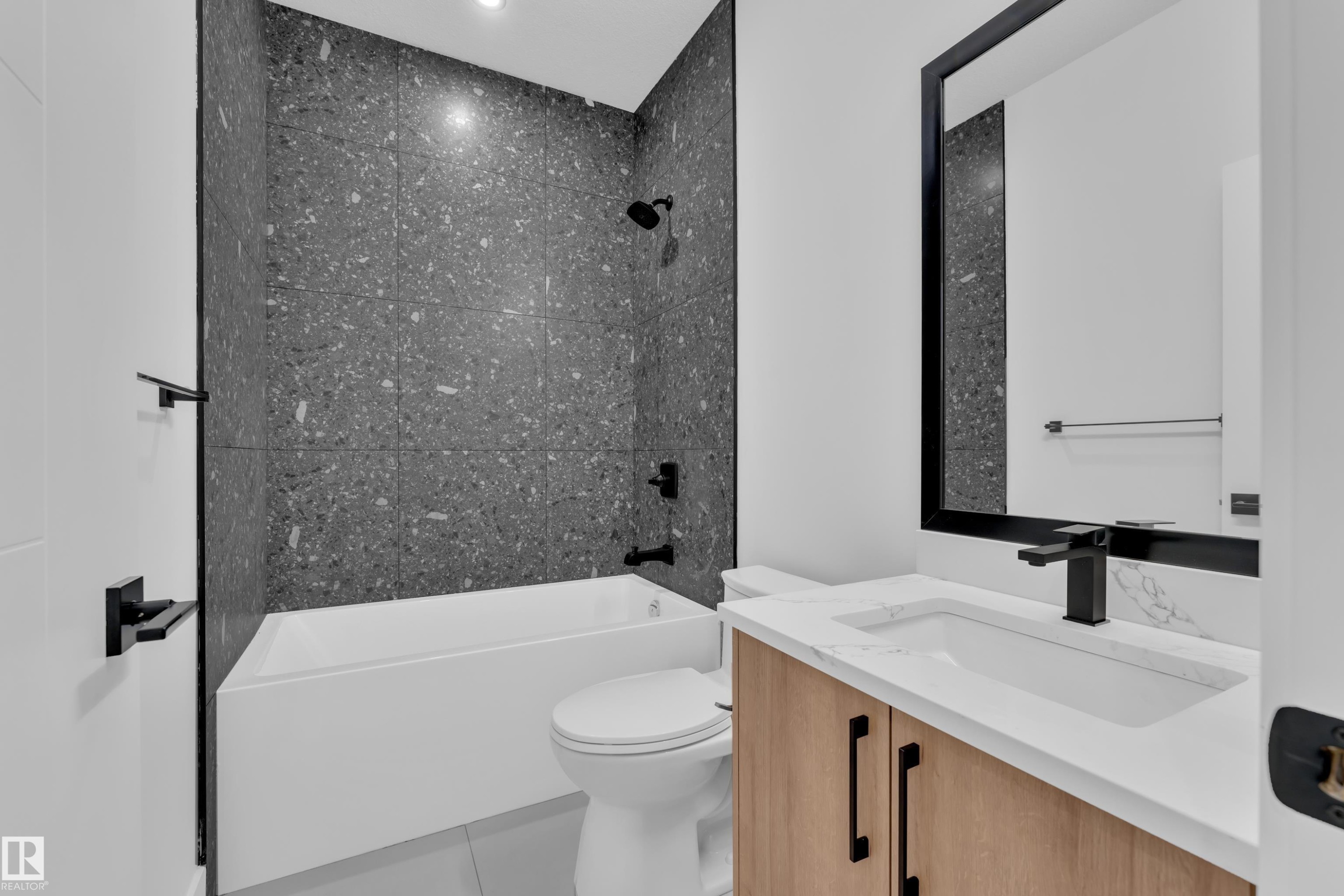Full bath featuring shower / bathtub combination, vanity, and tile patterned floors - 733 Astoria Way, Devon, AB - Indoor Photo Showing Bathroom