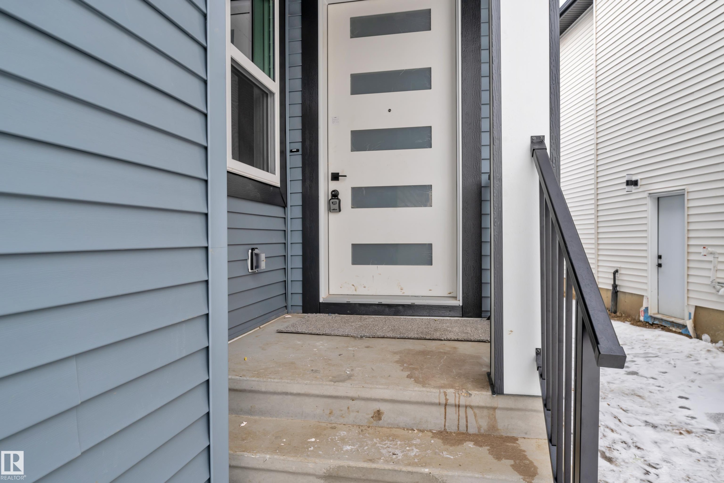 Doorway to property - 733 Astoria Way, Devon, AB - Outdoor With Exterior
