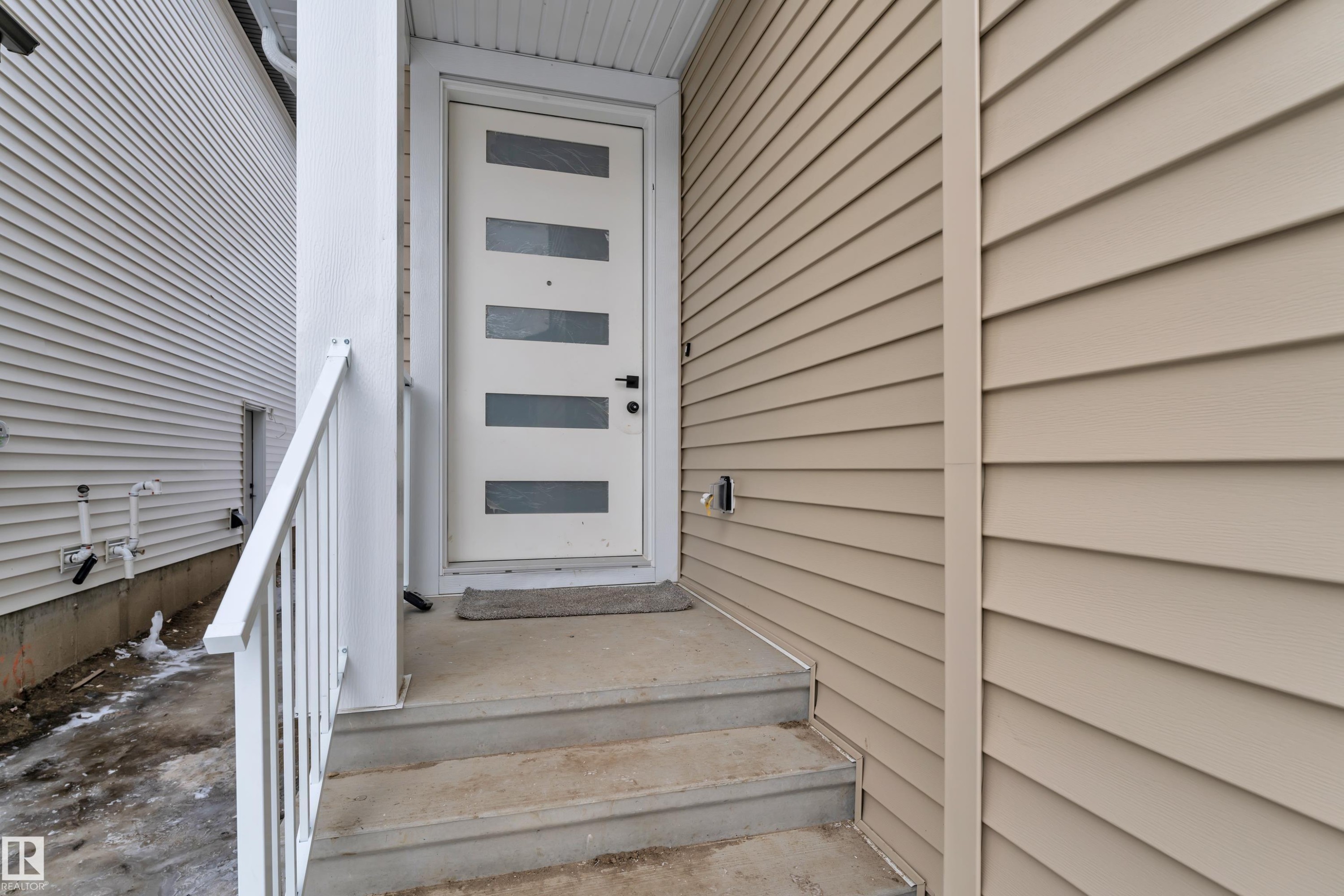 Property entrance - 737 Astoria Way, Devon, AB - Outdoor With Exterior