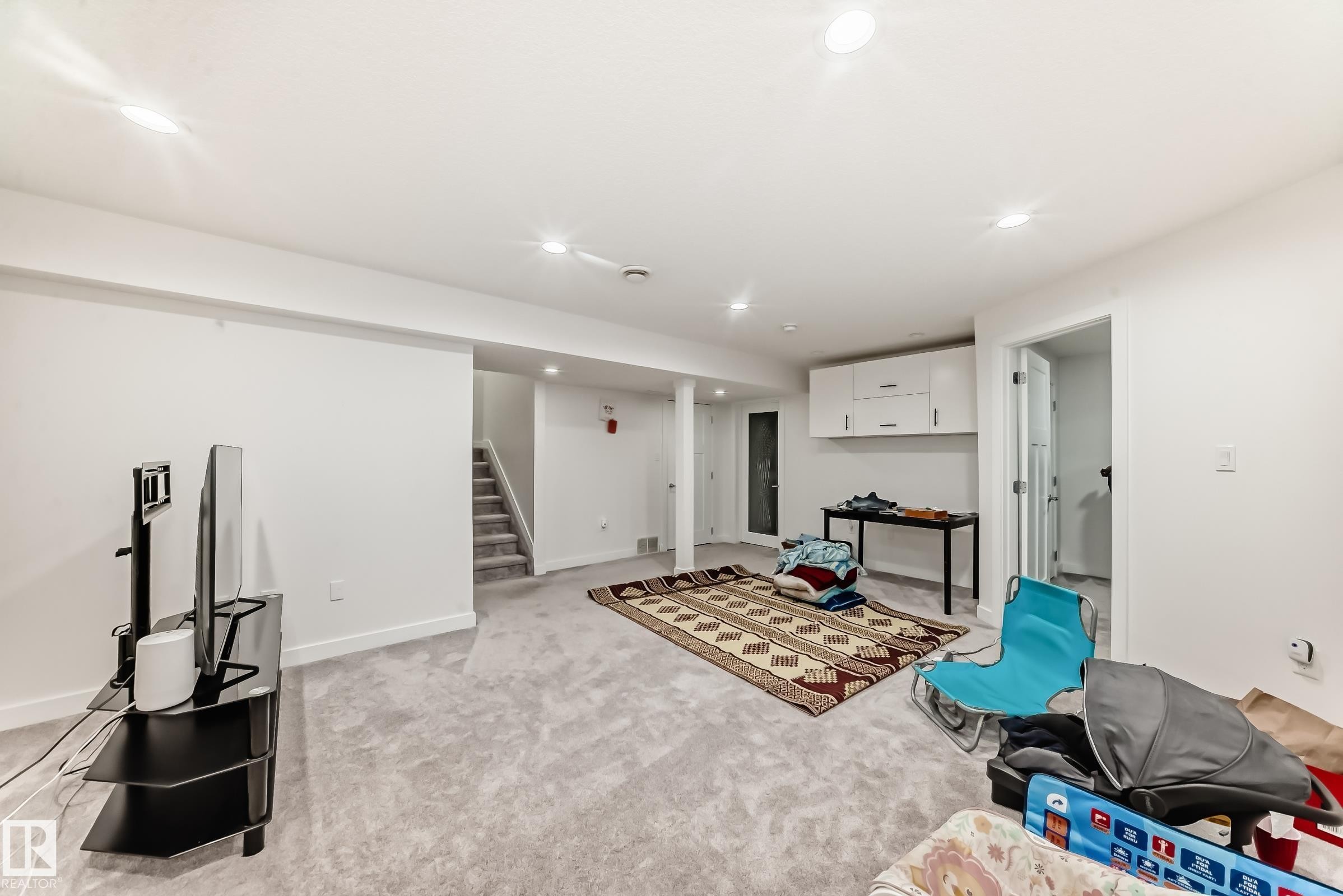 Workout area with light colored carpet and recessed lighting - 5814 165 Avenue, Edmonton, AB - Indoor