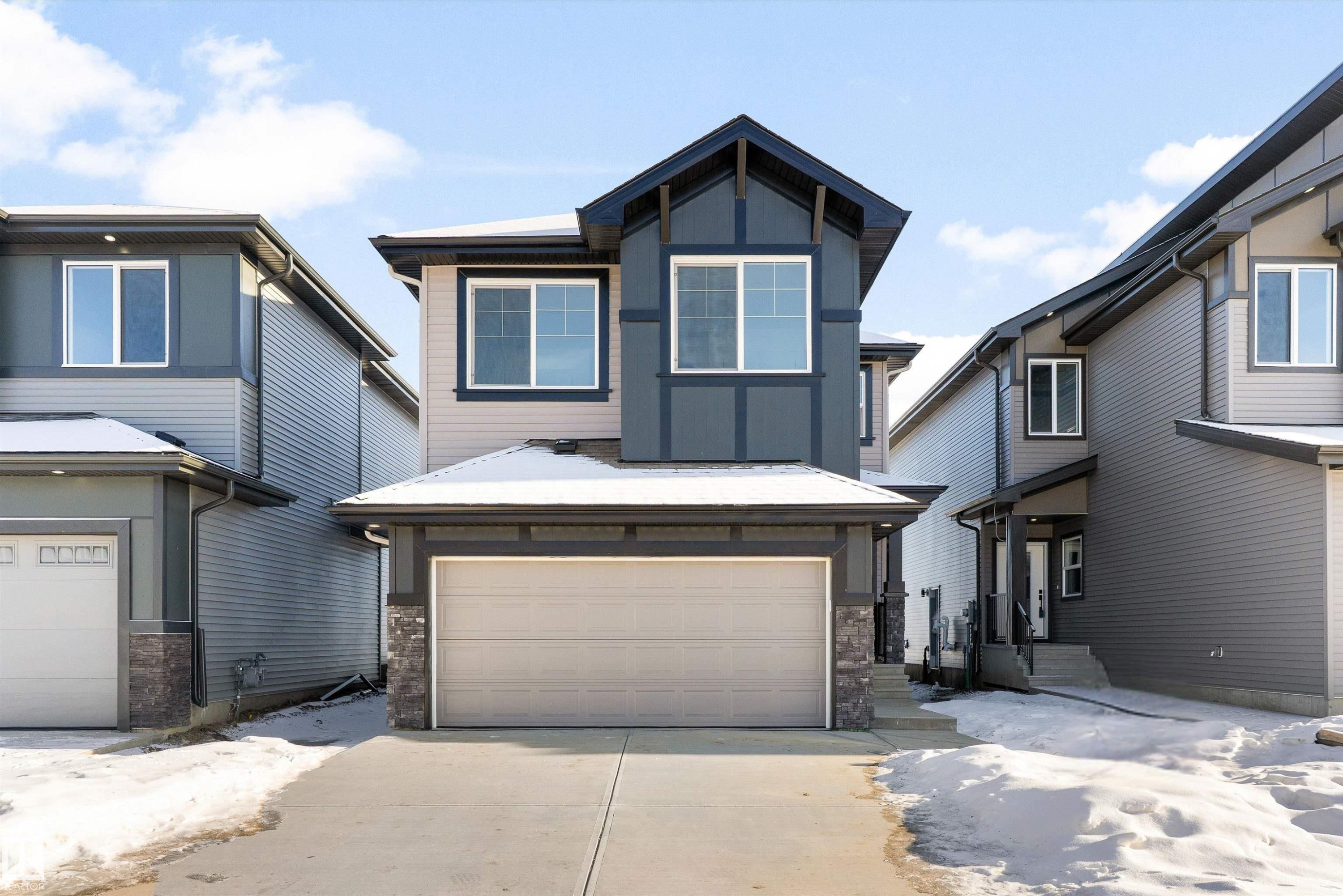 748 Astoria Way, Devon, AB - Outdoor With Facade