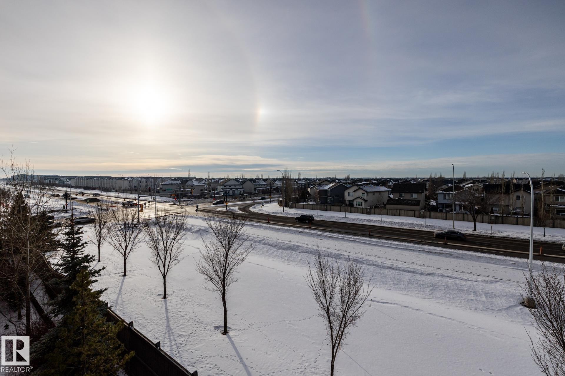 Water view with nearby suburban area - 407 2590 Anderson Way, Edmonton, AB - Outdoor With View