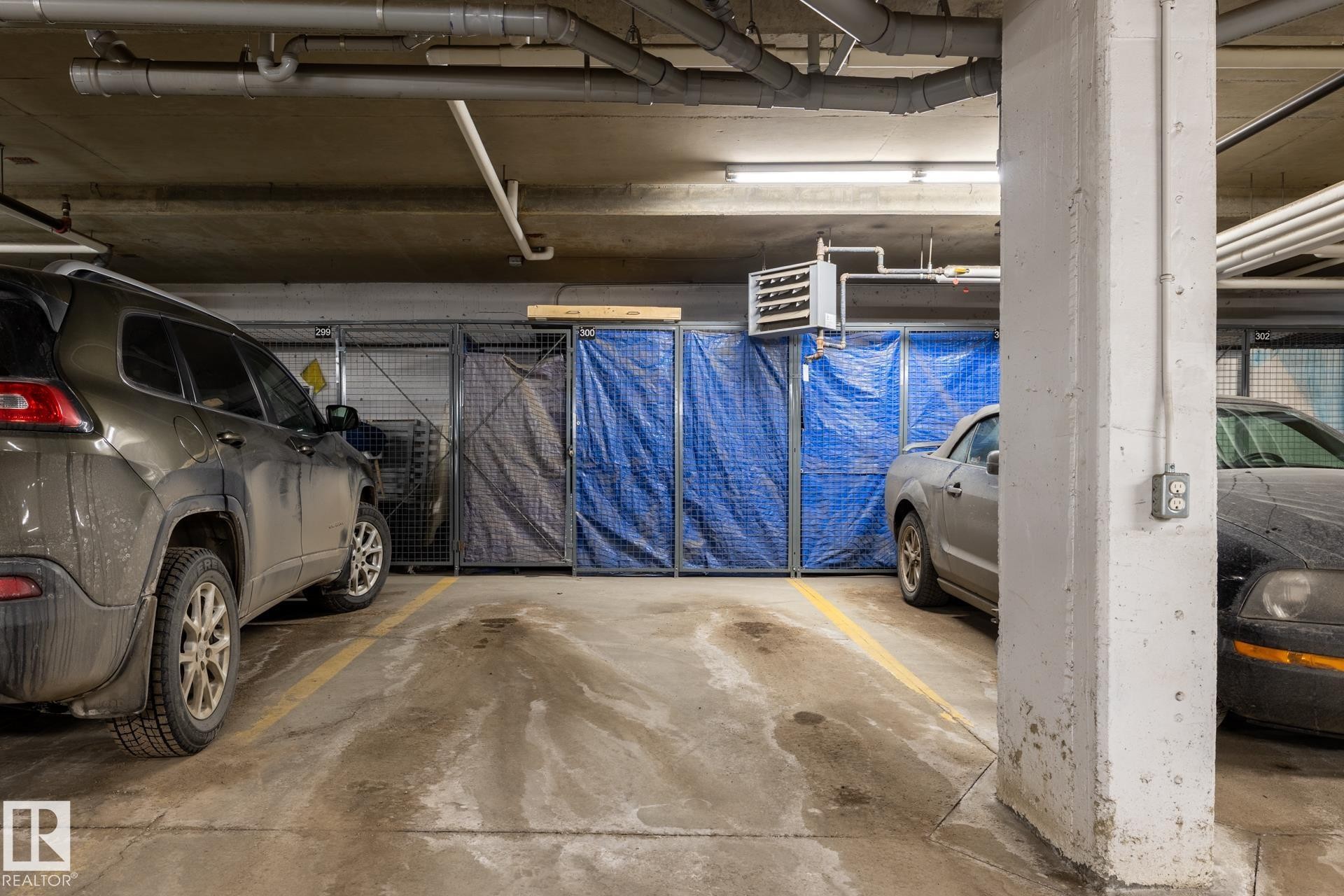 Parking deck with a heating unit - 407 2590 Anderson Way, Edmonton, AB - Indoor Photo Showing Garage