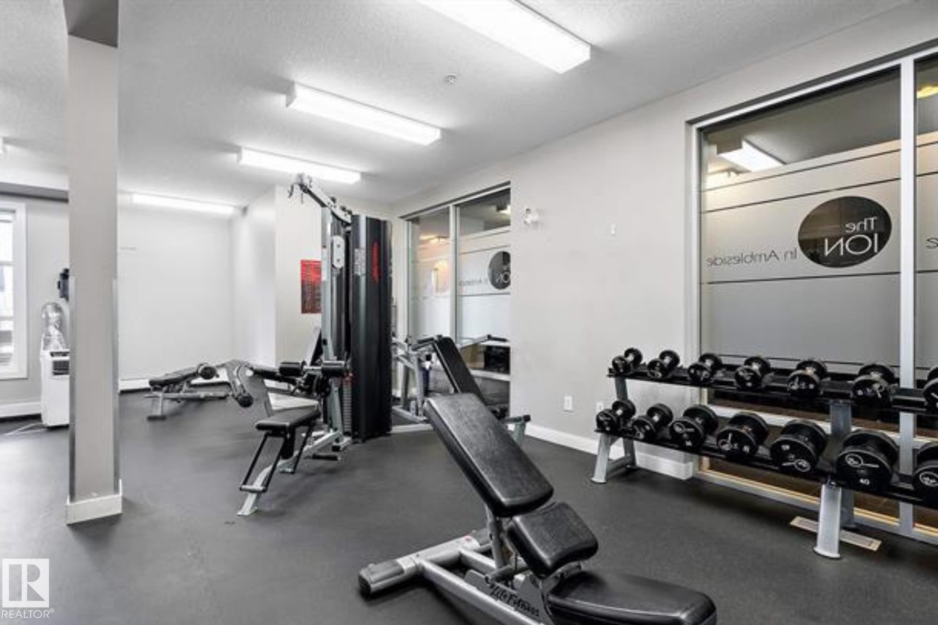 Workout area with a textured ceiling - 407 2590 Anderson Way, Edmonton, AB - Indoor Photo Showing Gym Room